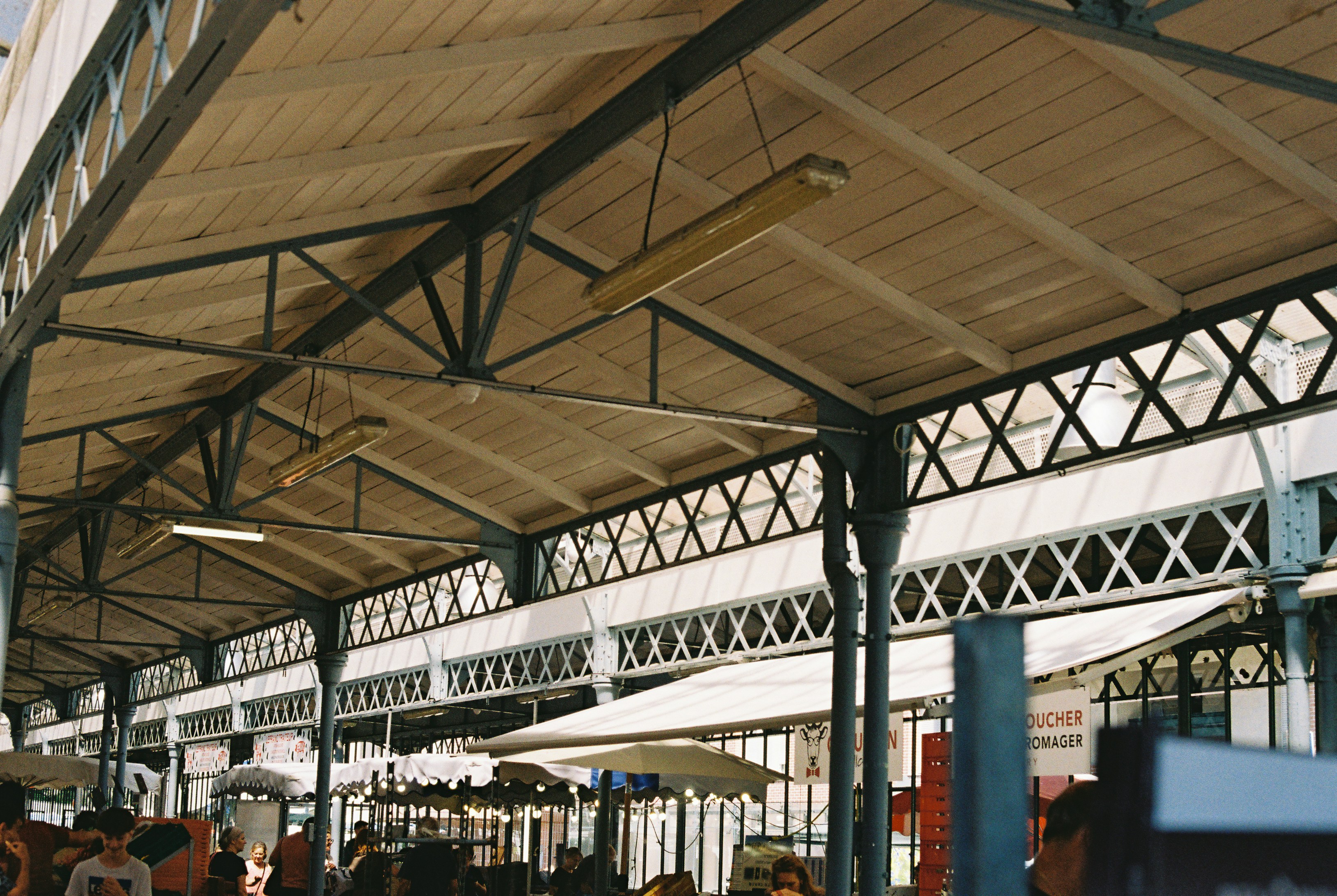 Covered market hall with metal roof beams