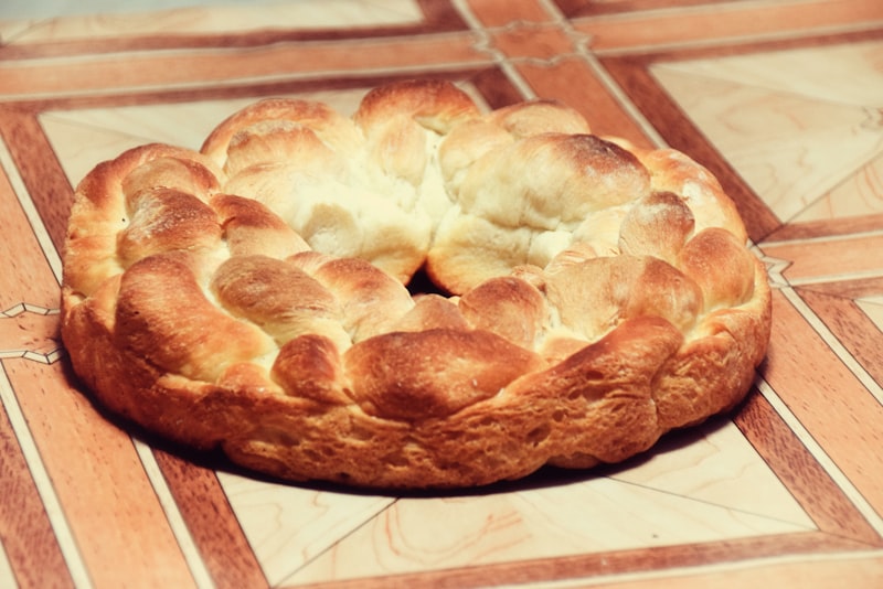 A freshly baked braided loaf of bread
