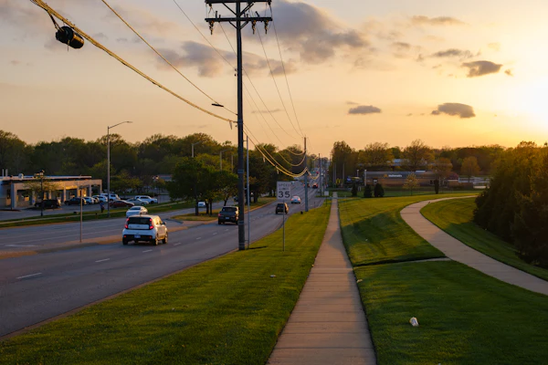 Suburban road at sunset