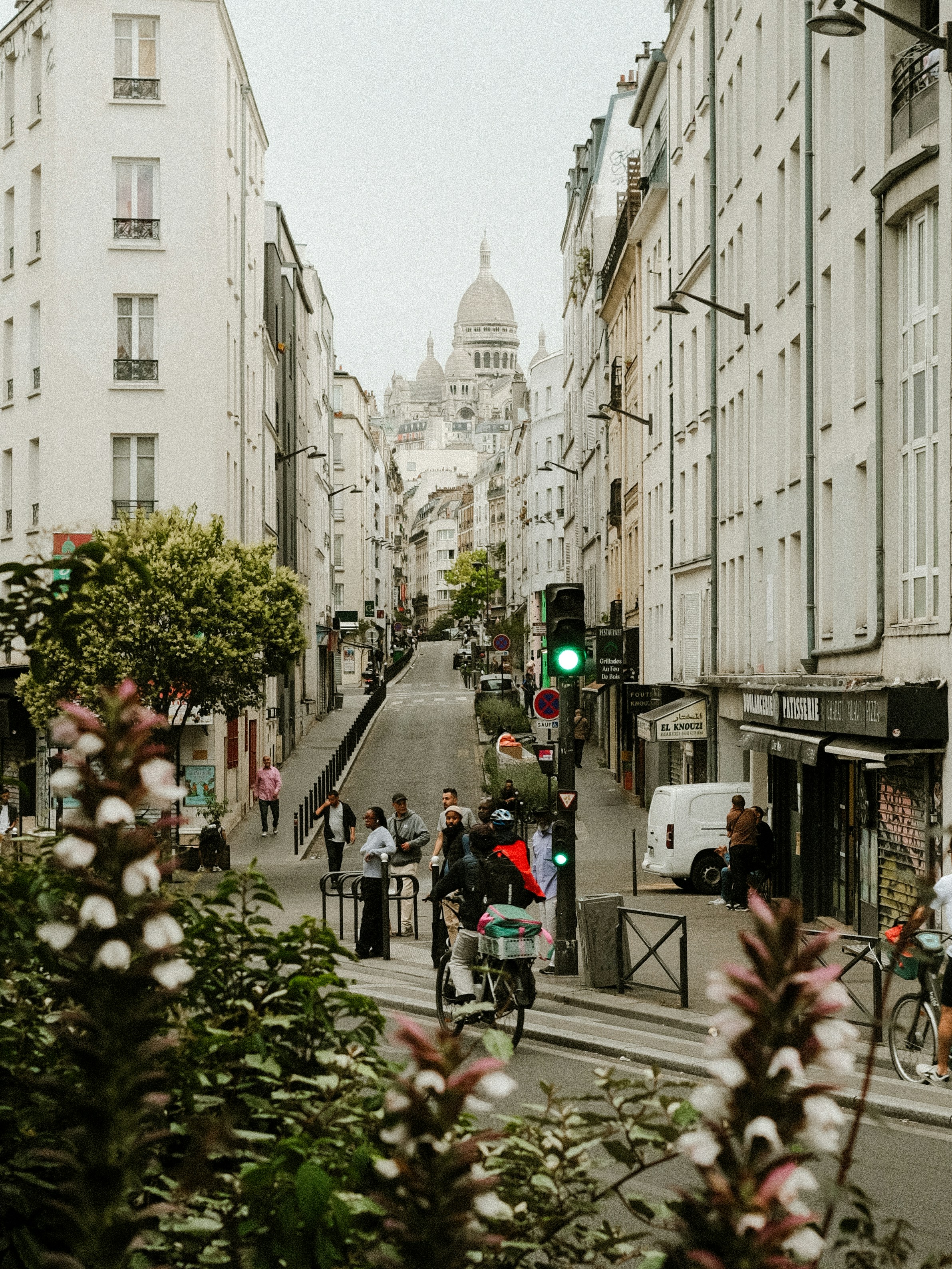 Parisian street leading to sacré-cœur basilica.