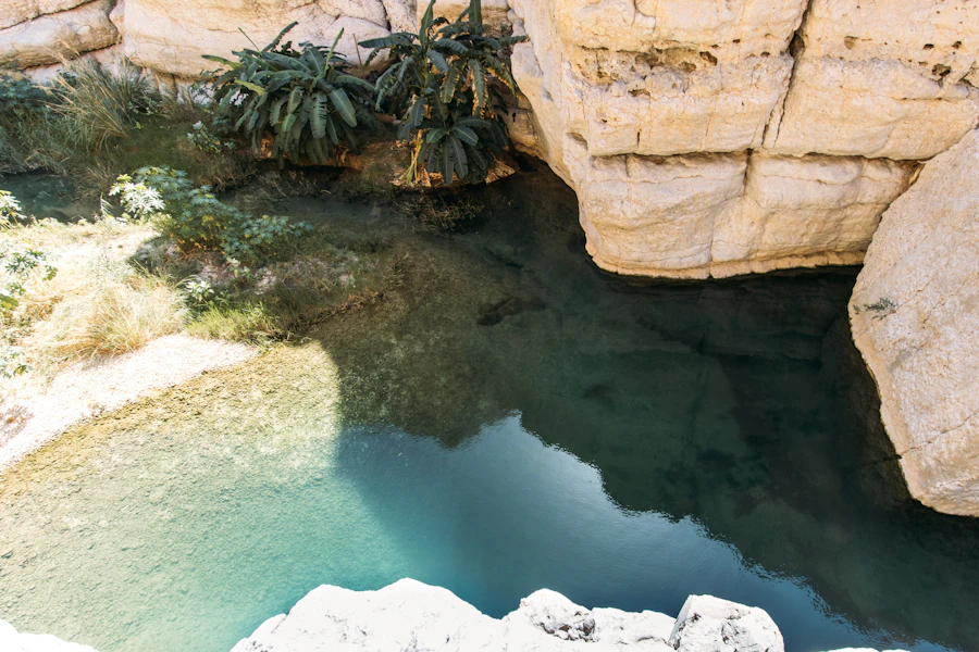 Clear blue natural pool in a rocky canyon