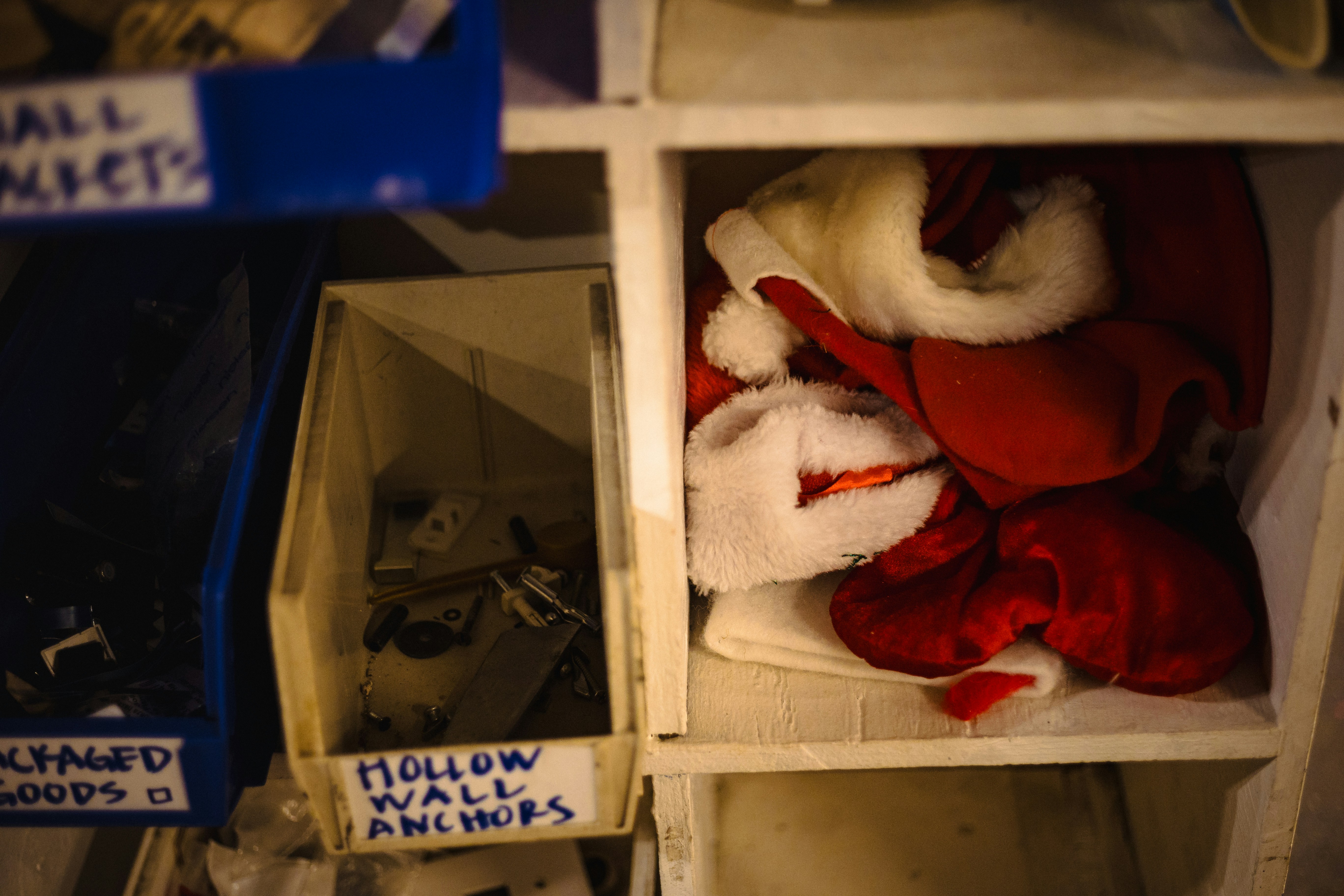 Santa claus costume in a storage cubby