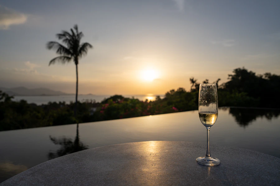 Champagne by an infinity pool