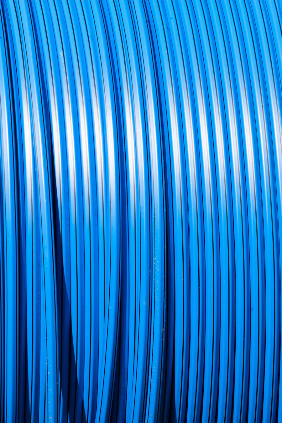 A coil of blue PEX tubing