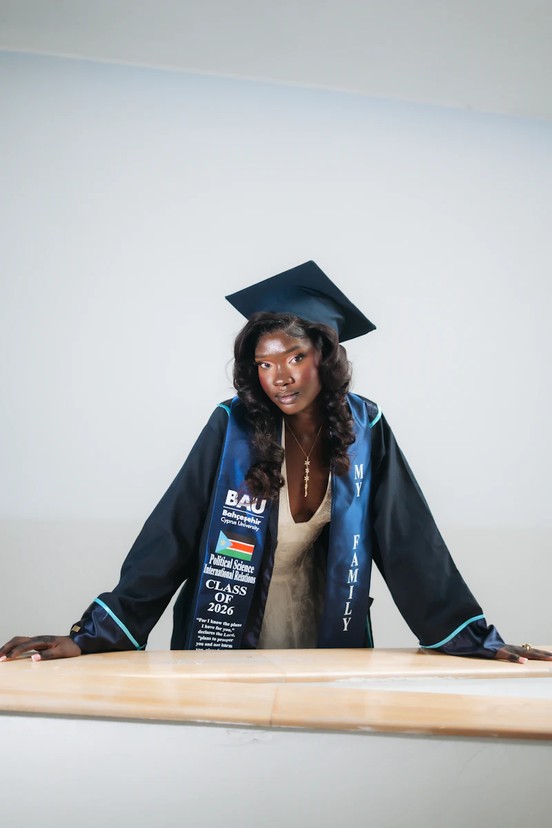 Young graduate wearing a cap and gown