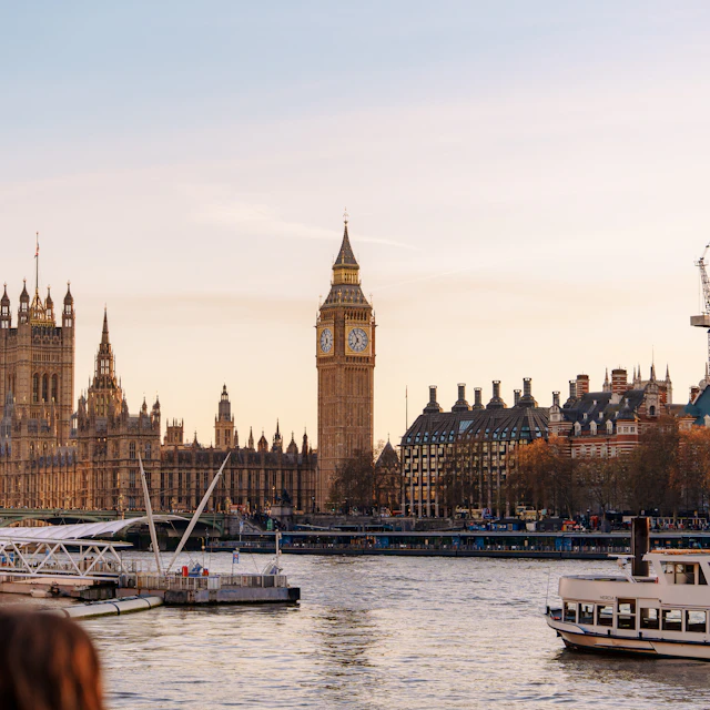 The London skyline with Big Ben and the Houses of Parliament beside the River Thames