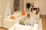 Stylish living room featuring cream furniture and contemporary decor