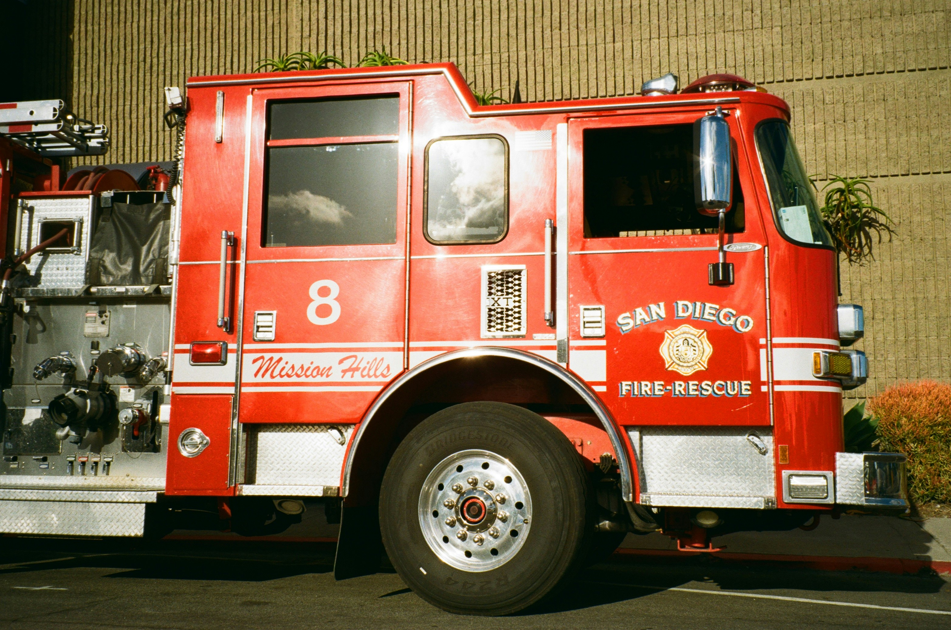 A red san diego fire-rescue truck with number 8