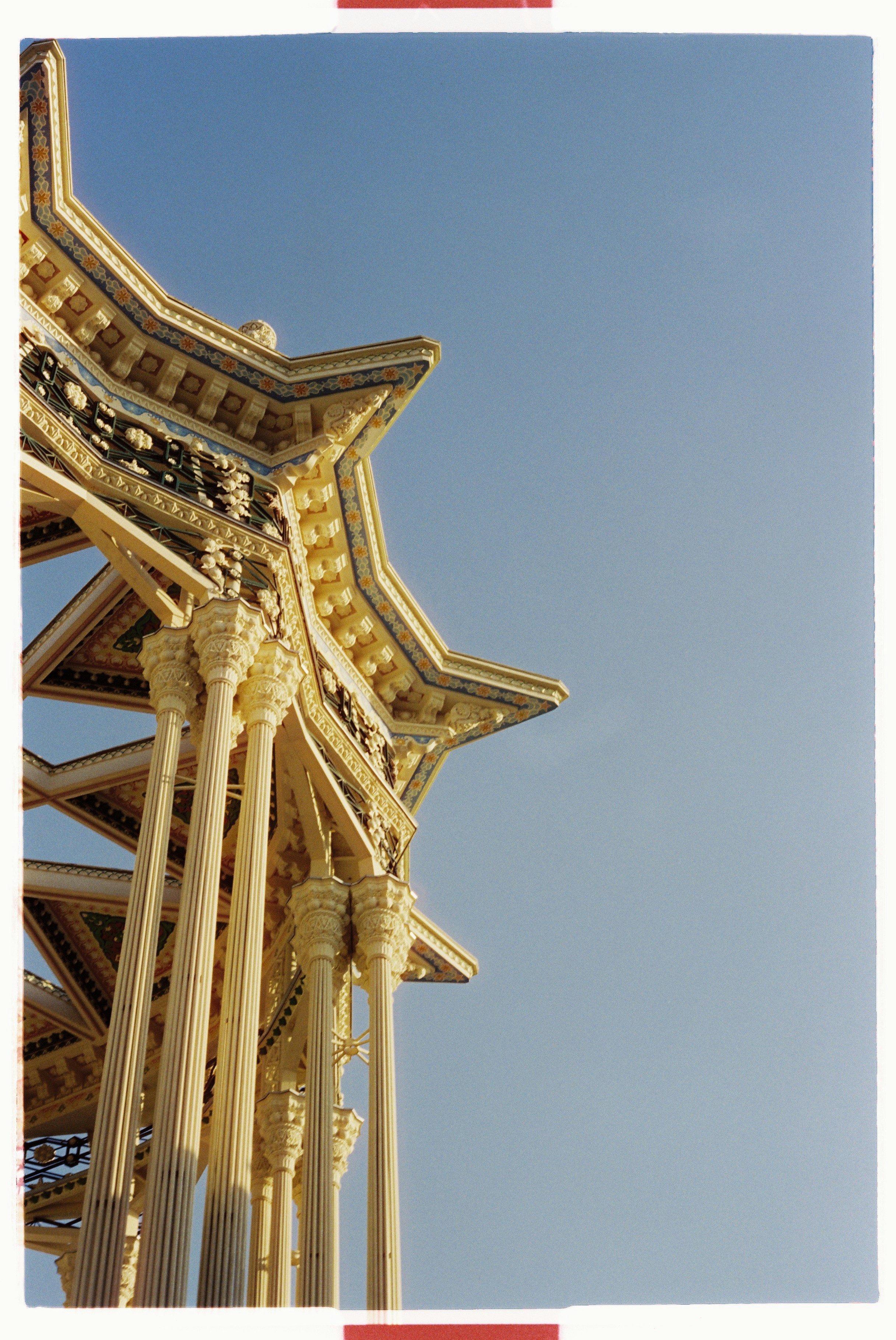 Ornate architectural details of one of VDNKh's iconic pavilions photographed on 35mm film under a cloudless summer sky. - 相关推荐