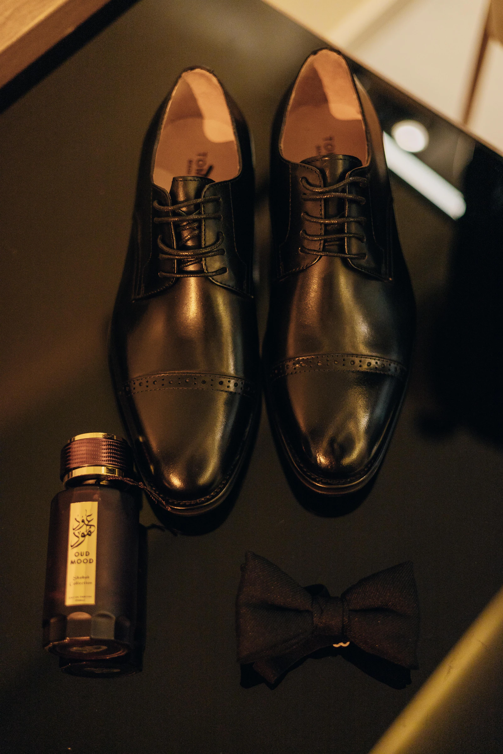 Black dress shoes with cologne