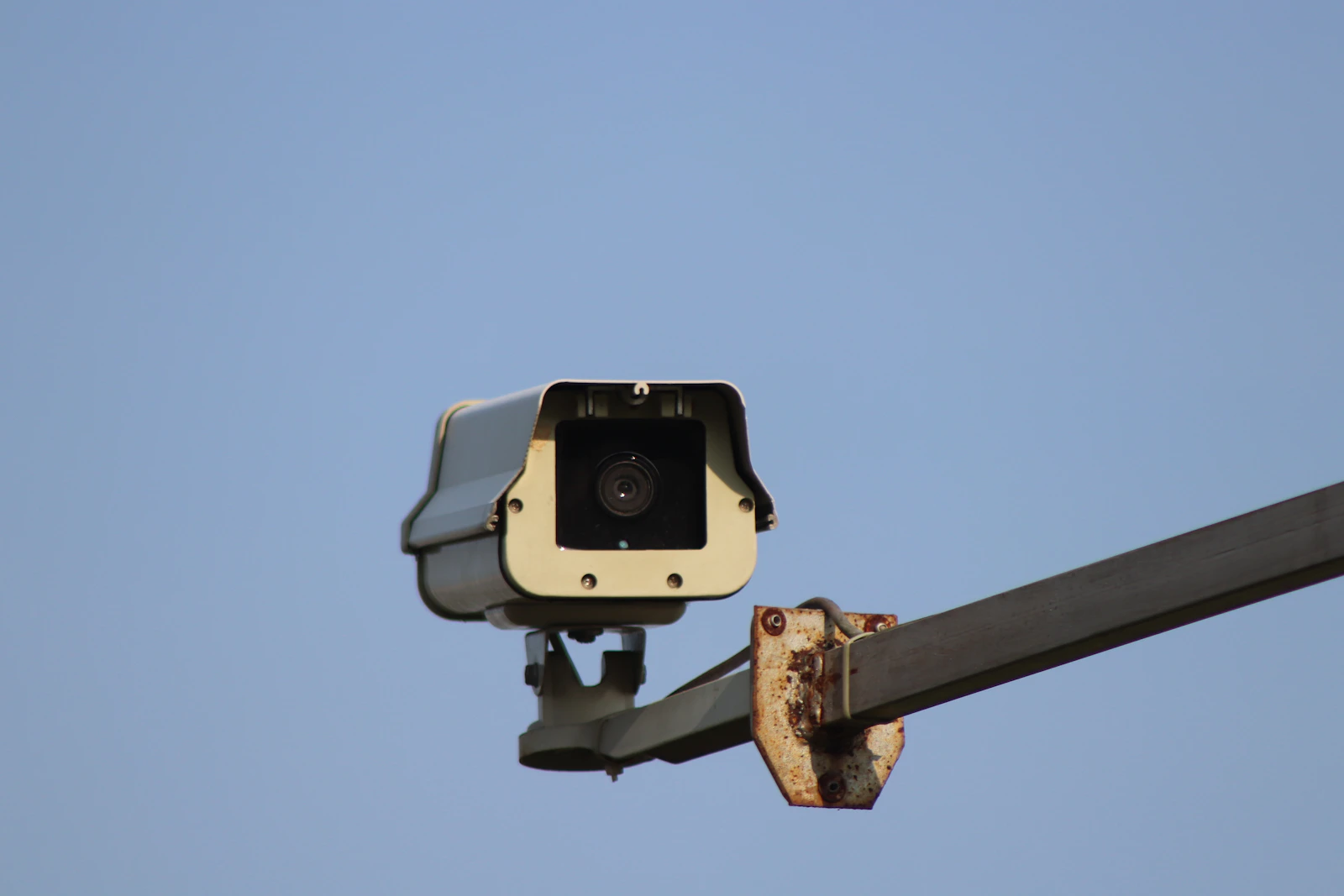 Security surveillance camera for monitored facilities