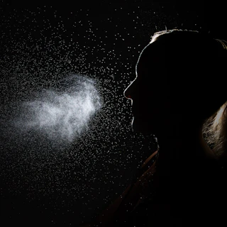 Fine facial mist spray in soft light
