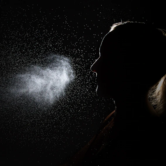 Fine facial mist spray in soft light