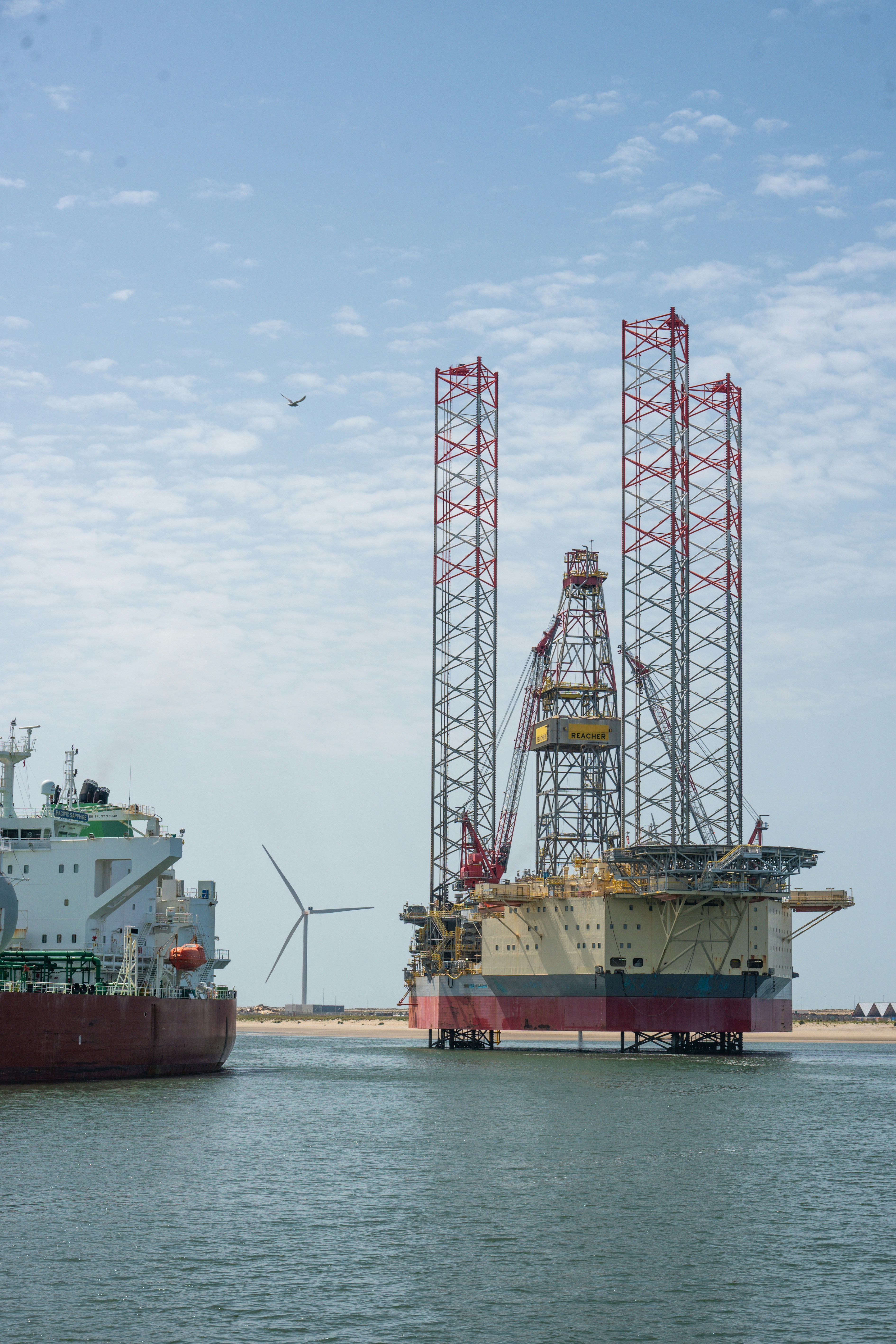 Offshore construction vessel and wind turbine representing maritime project finance