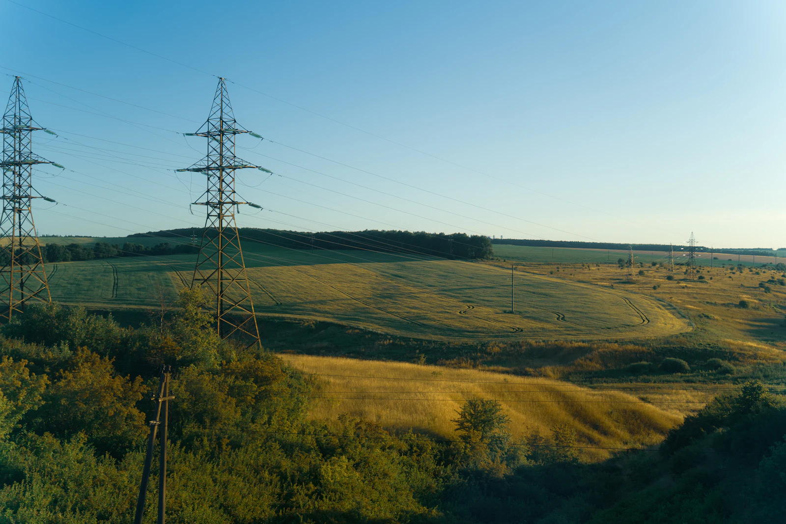 Electricity transmission lines crossing productive farmland