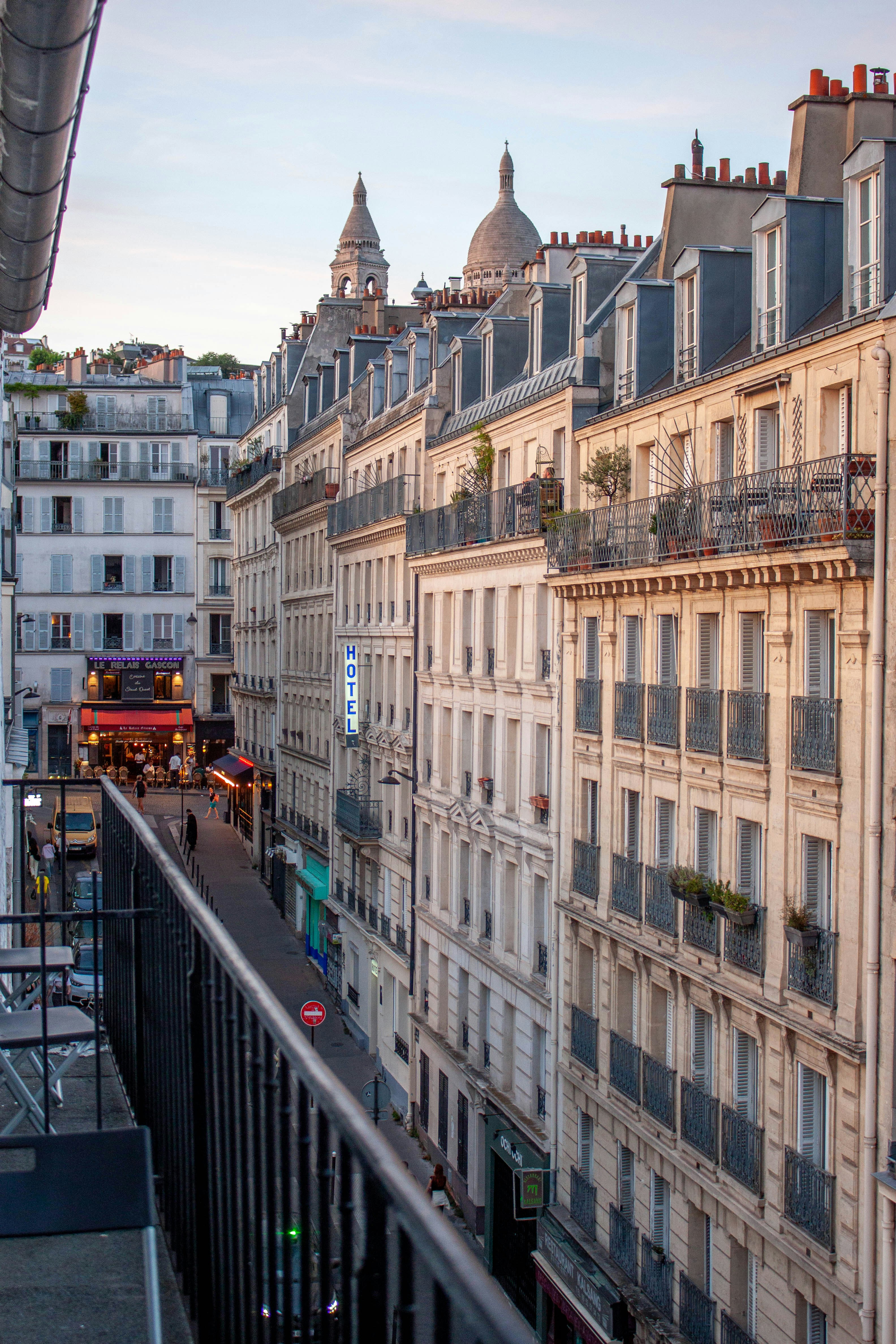 Private balcony of the Rosa Lodge presidential suite with city sunset view