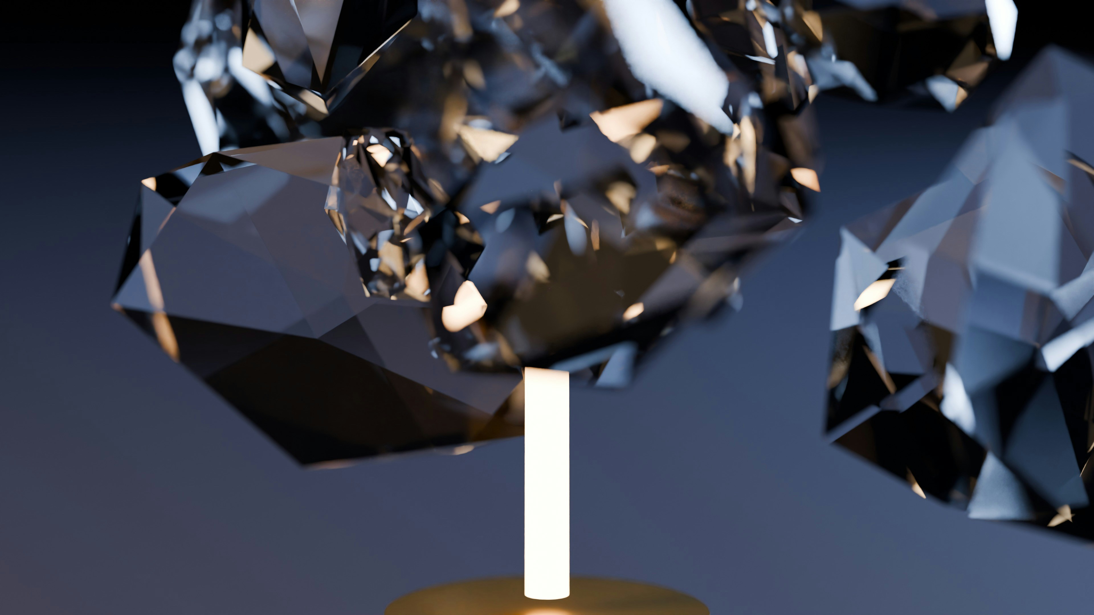 Dark faceted geometric shapes balanced on a glowing golden stand