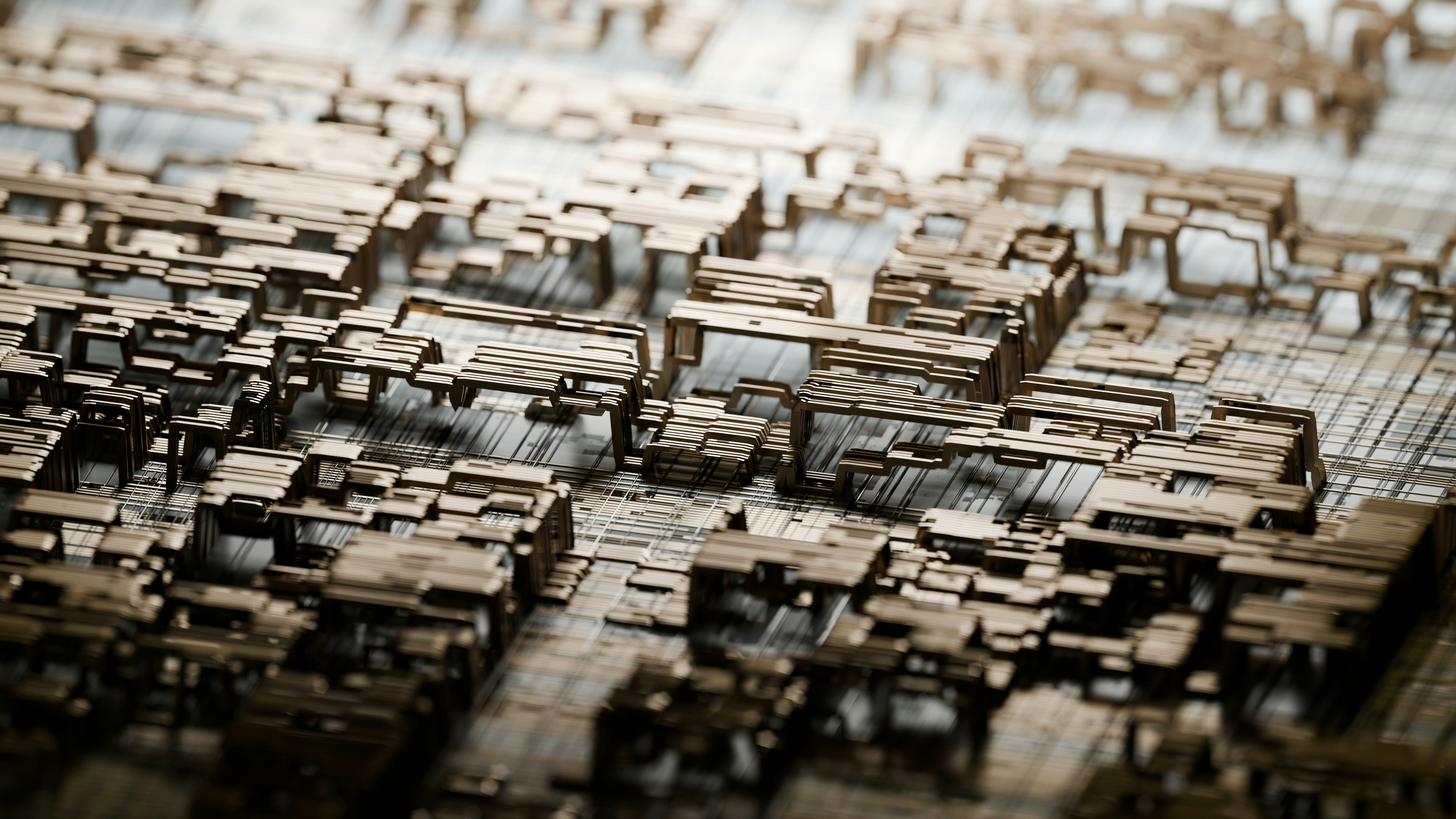 Intricate metallic surface resembling a microchip or cityscape.