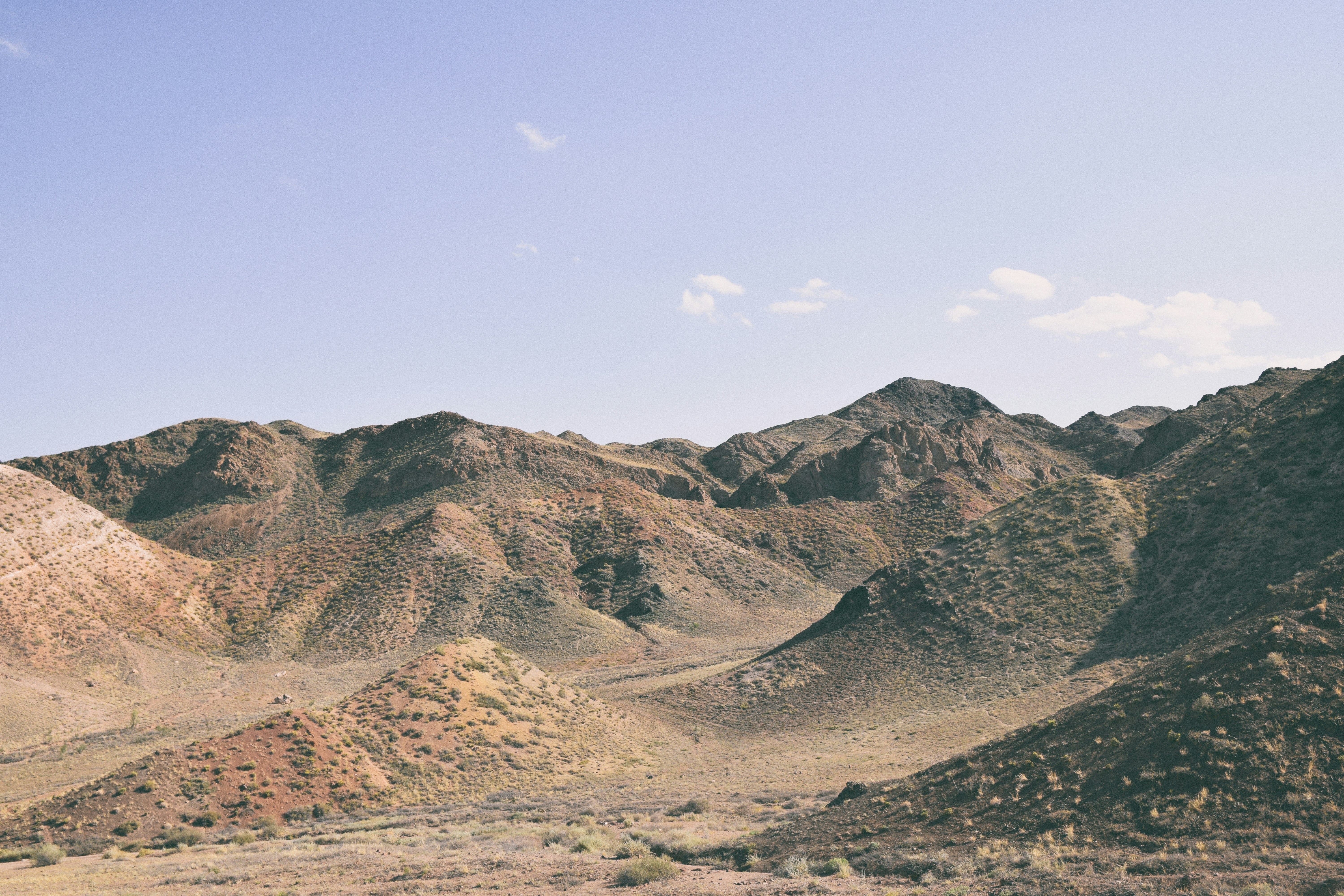 Rugged desert mountains under a clear blue sky