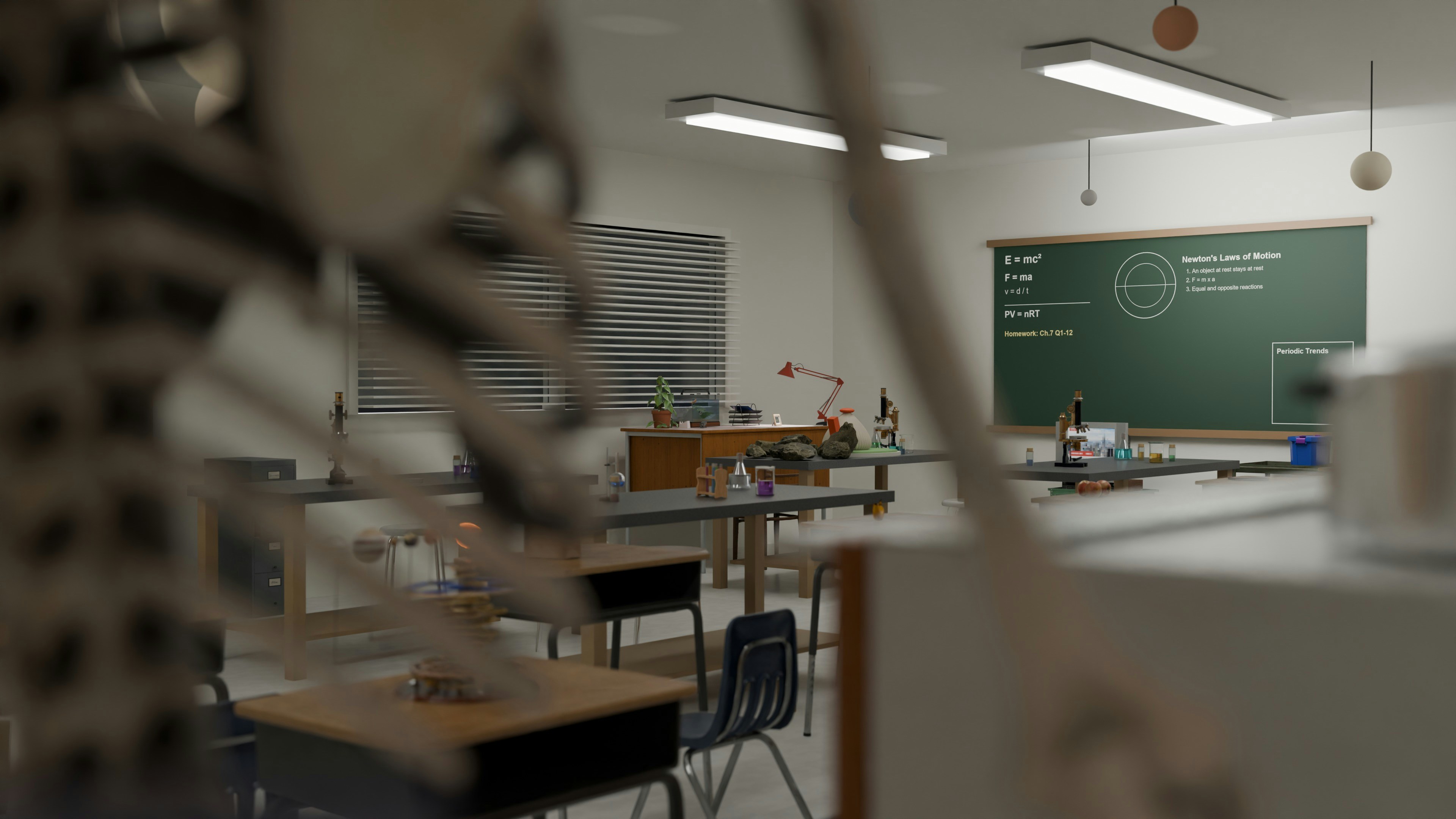 An empty science classroom with desks and a green blackboard.