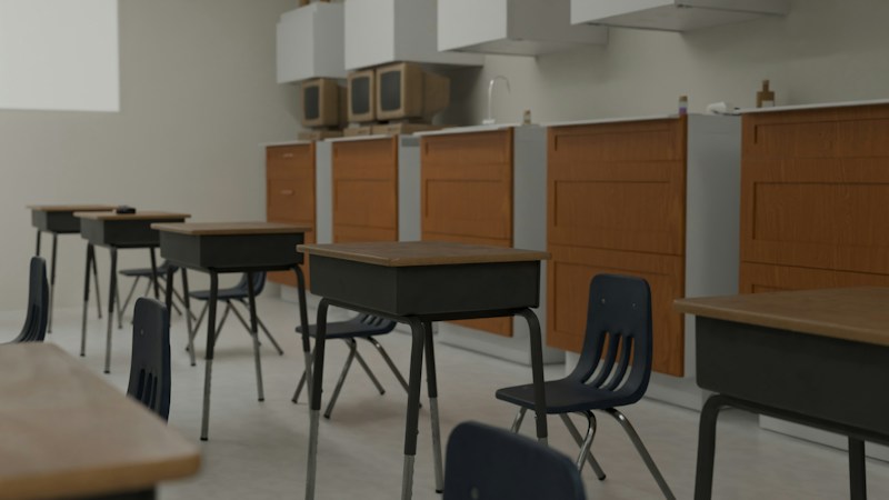 Empty classroom with rows of desks and chairs, representing the open seats at Silverado High School compared with crowded Desert Oasis High