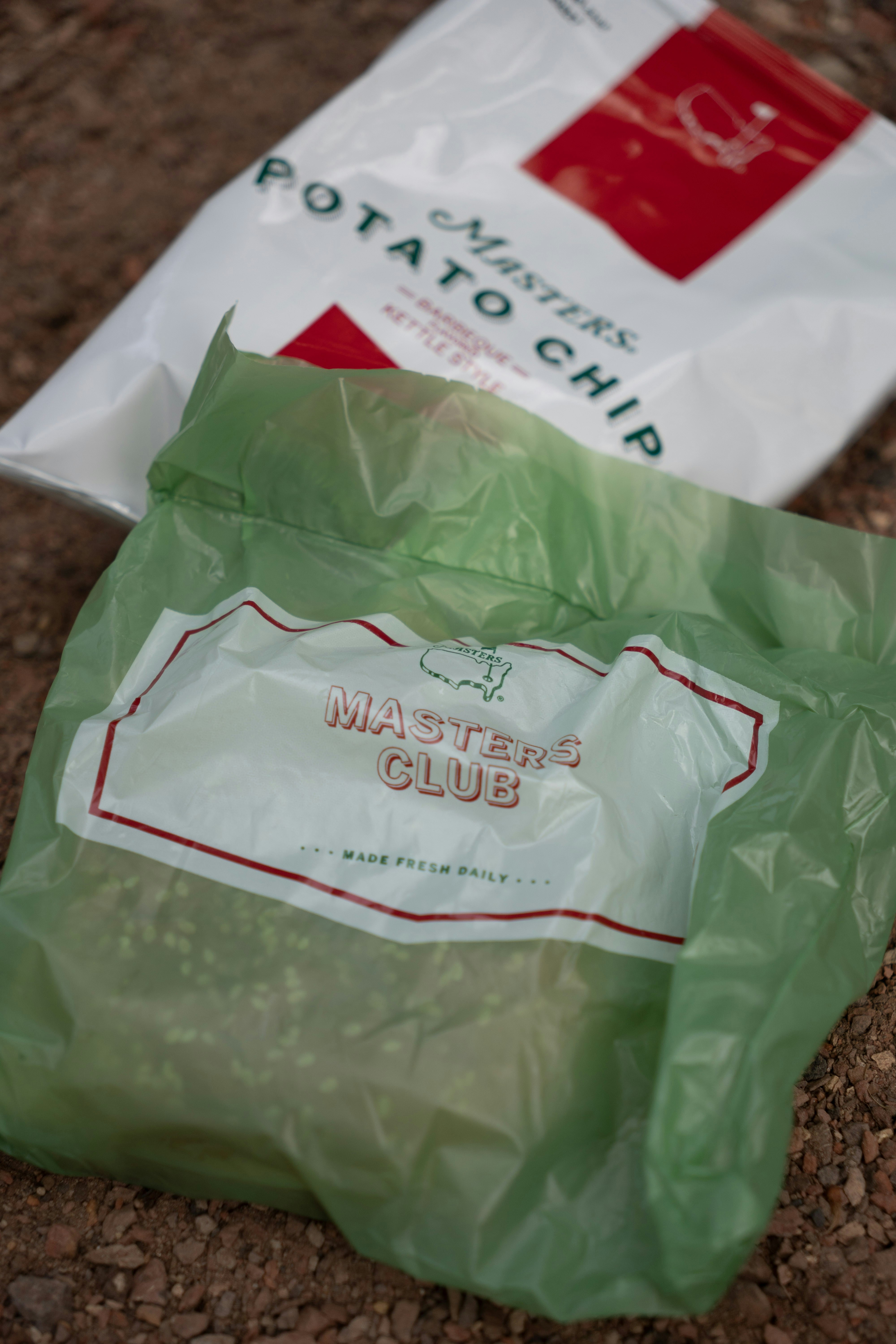 Two masters branded snack bags on a brown surface