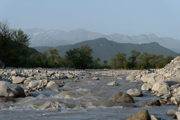 A rocky river below the mountains in the Azerbaijani Caucasus