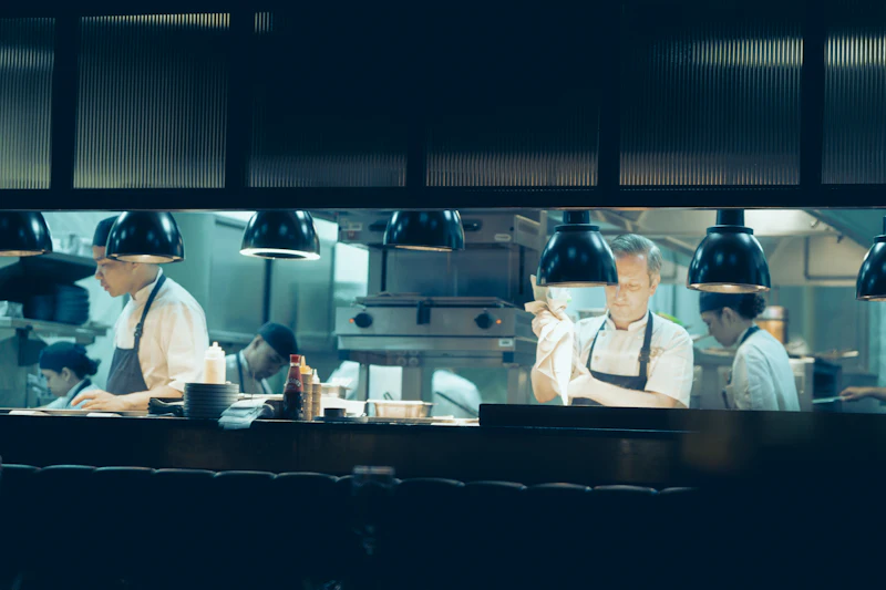 Chefs at work in a restaurant kitchen