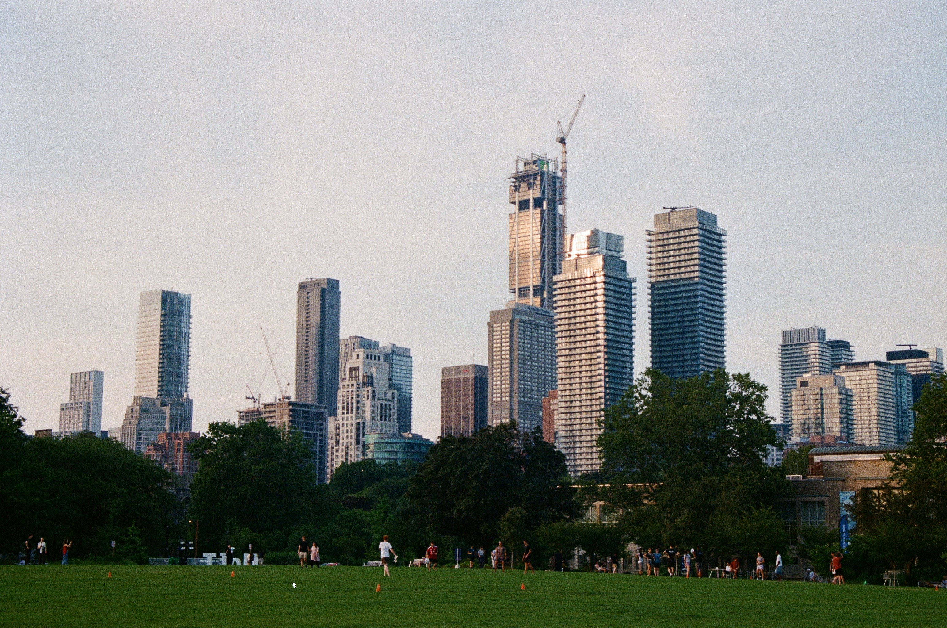 A modern urban park with high-end architecture and interactive public space
