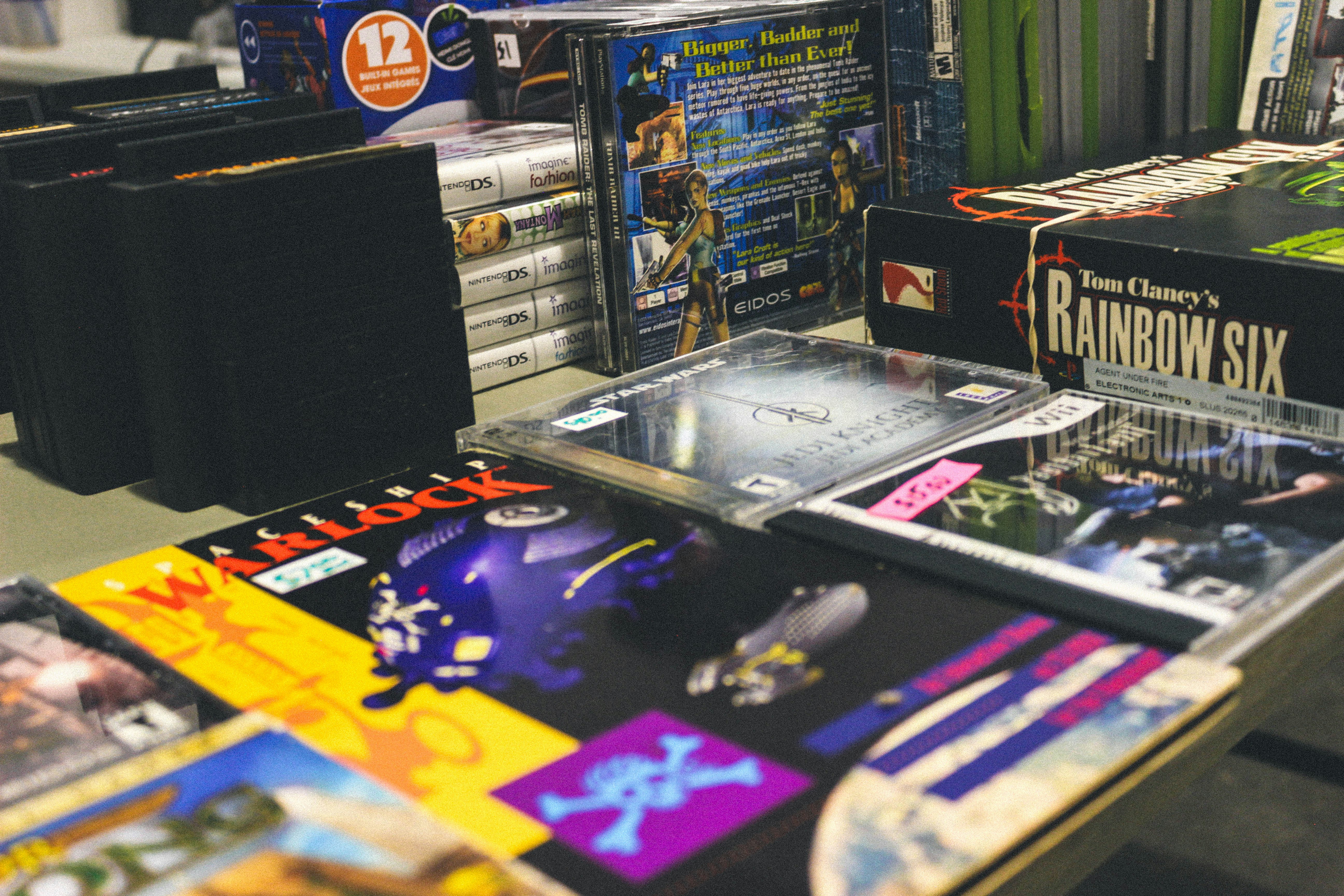 Stacked classic video game boxes and cases