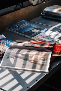 Magazines laid out in raking light