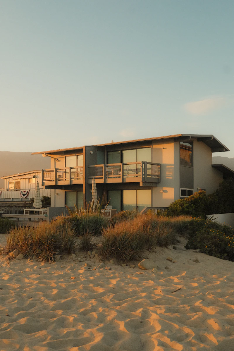 Modern beach house at sunset