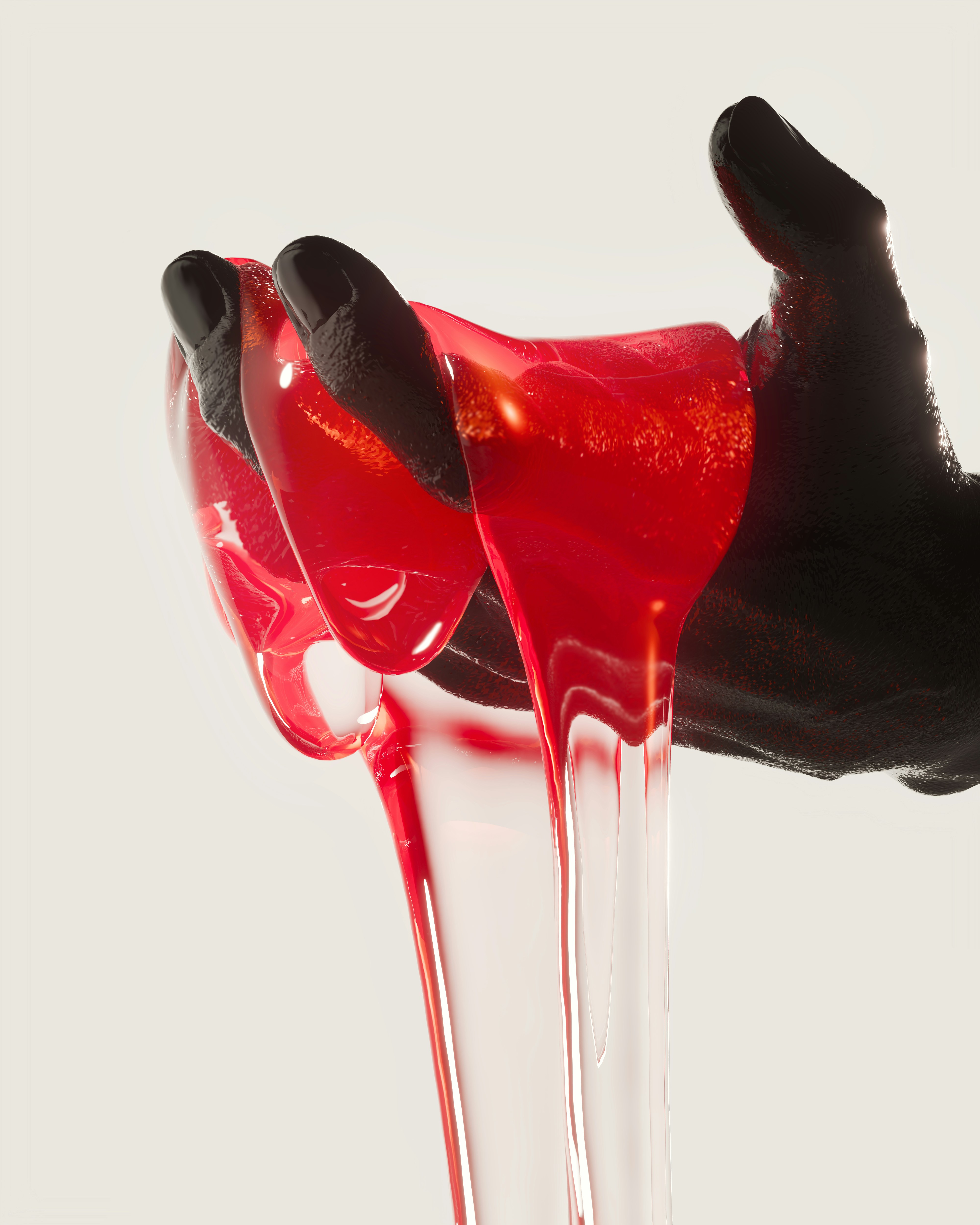 A black hand holding and stretching red gooey liquid.