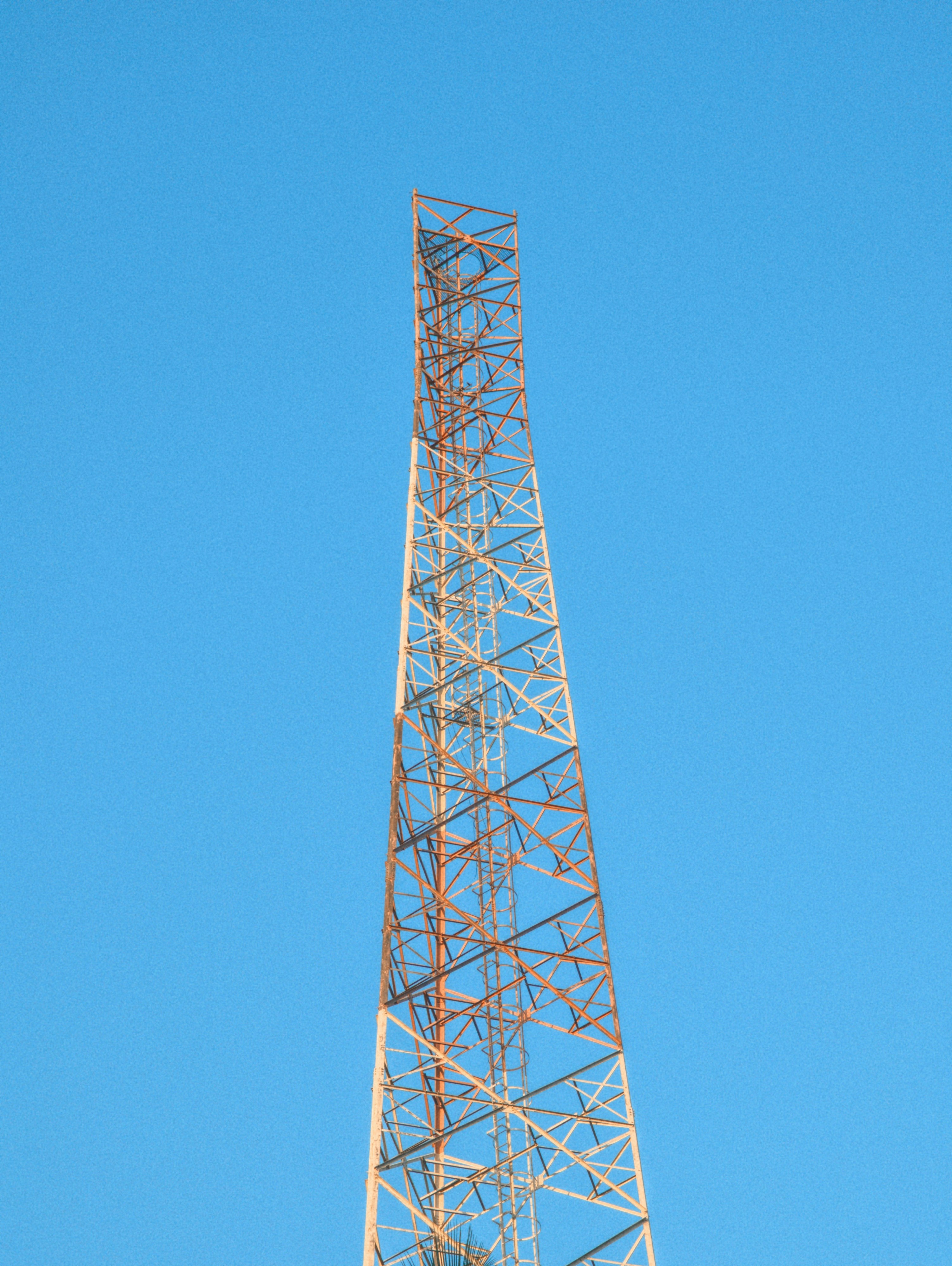 A cell tower in blue sky