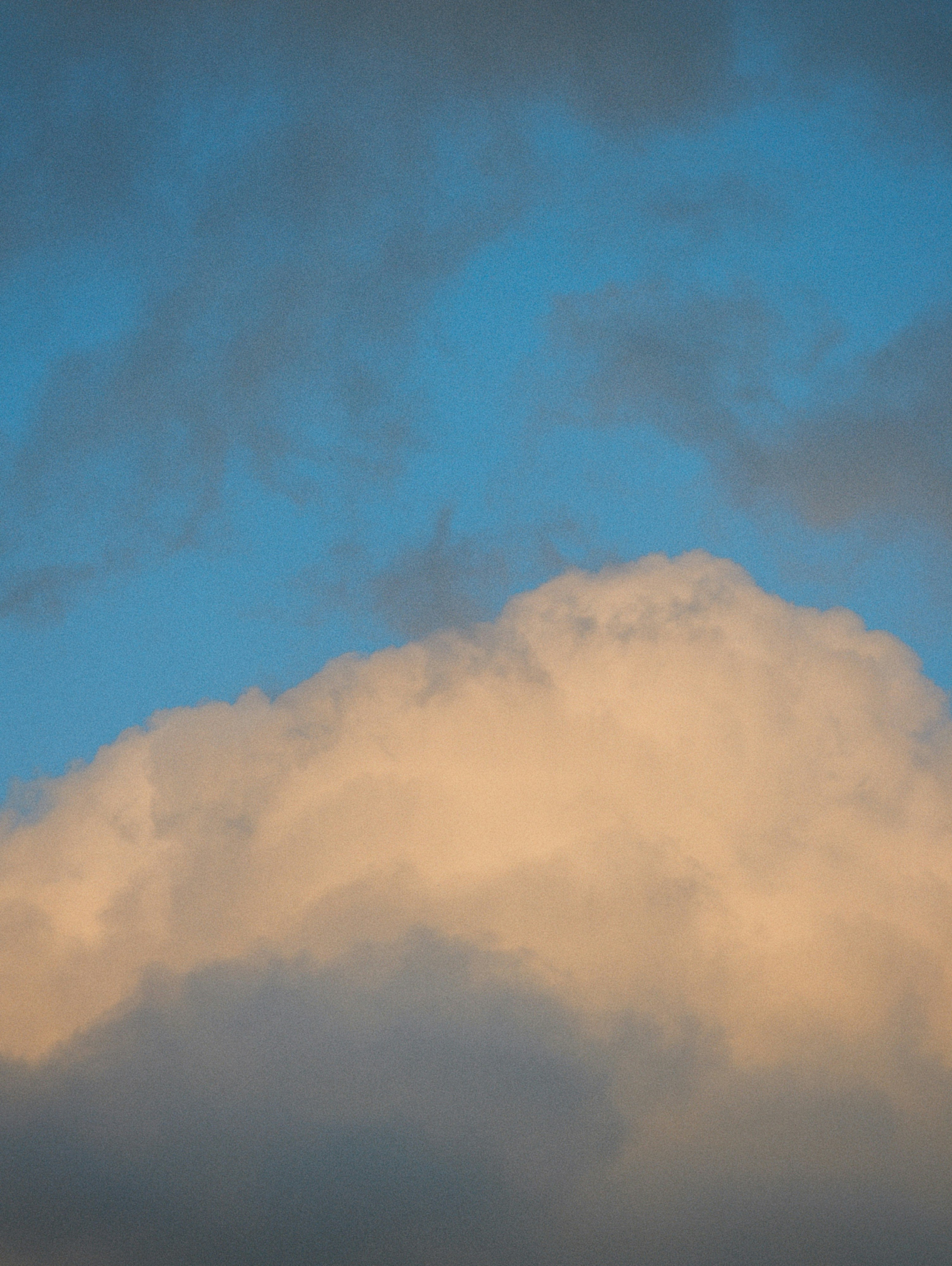Golden clouds in blue sky