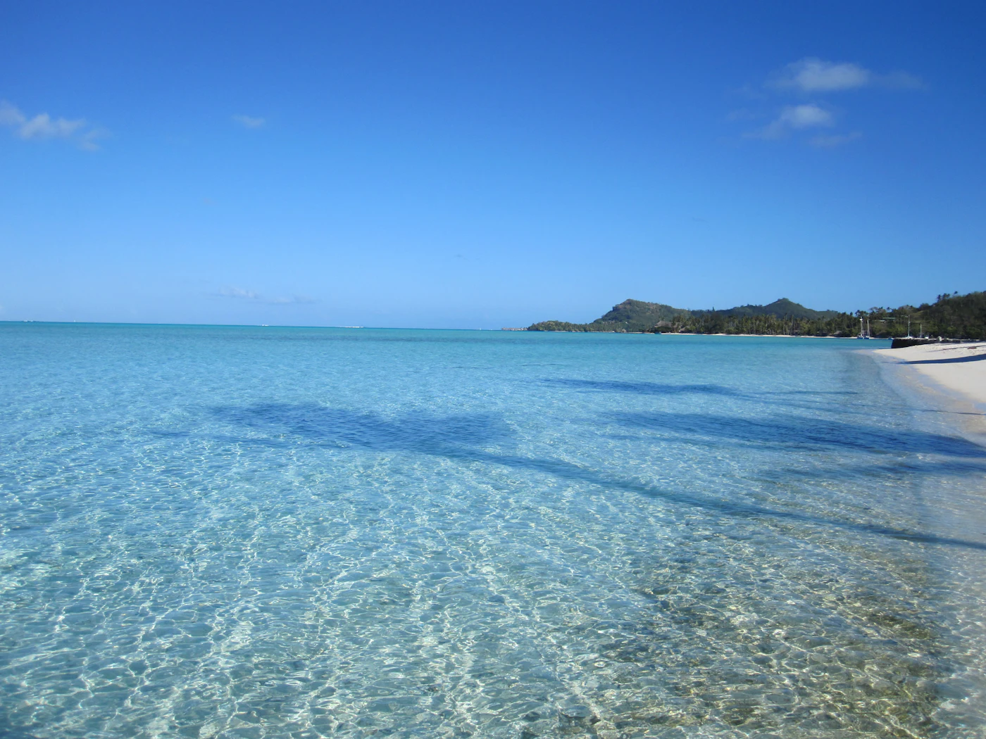 Turquoise lagoon and white-sand beach in Bora Bora, French Polynesia