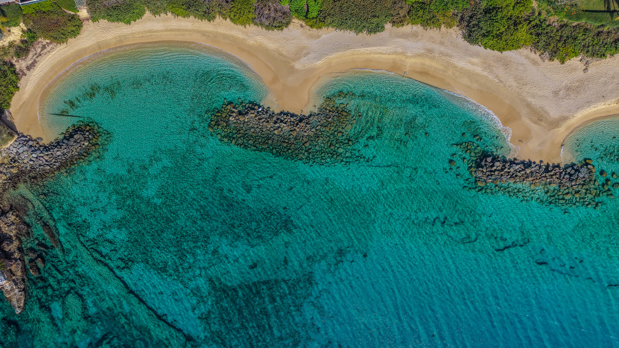 Aerial view of a Puerto Rico beach with turquoise water