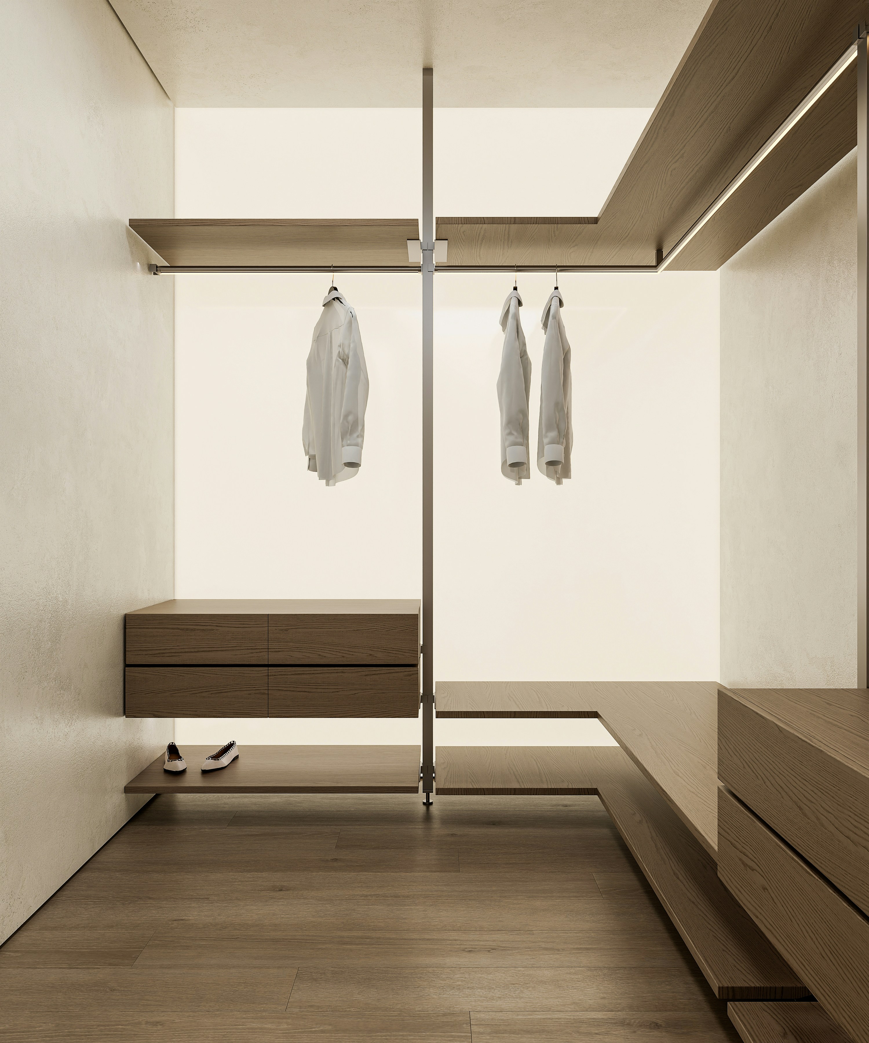 Minimalist walk-in closet with wooden shelves and white shirts.