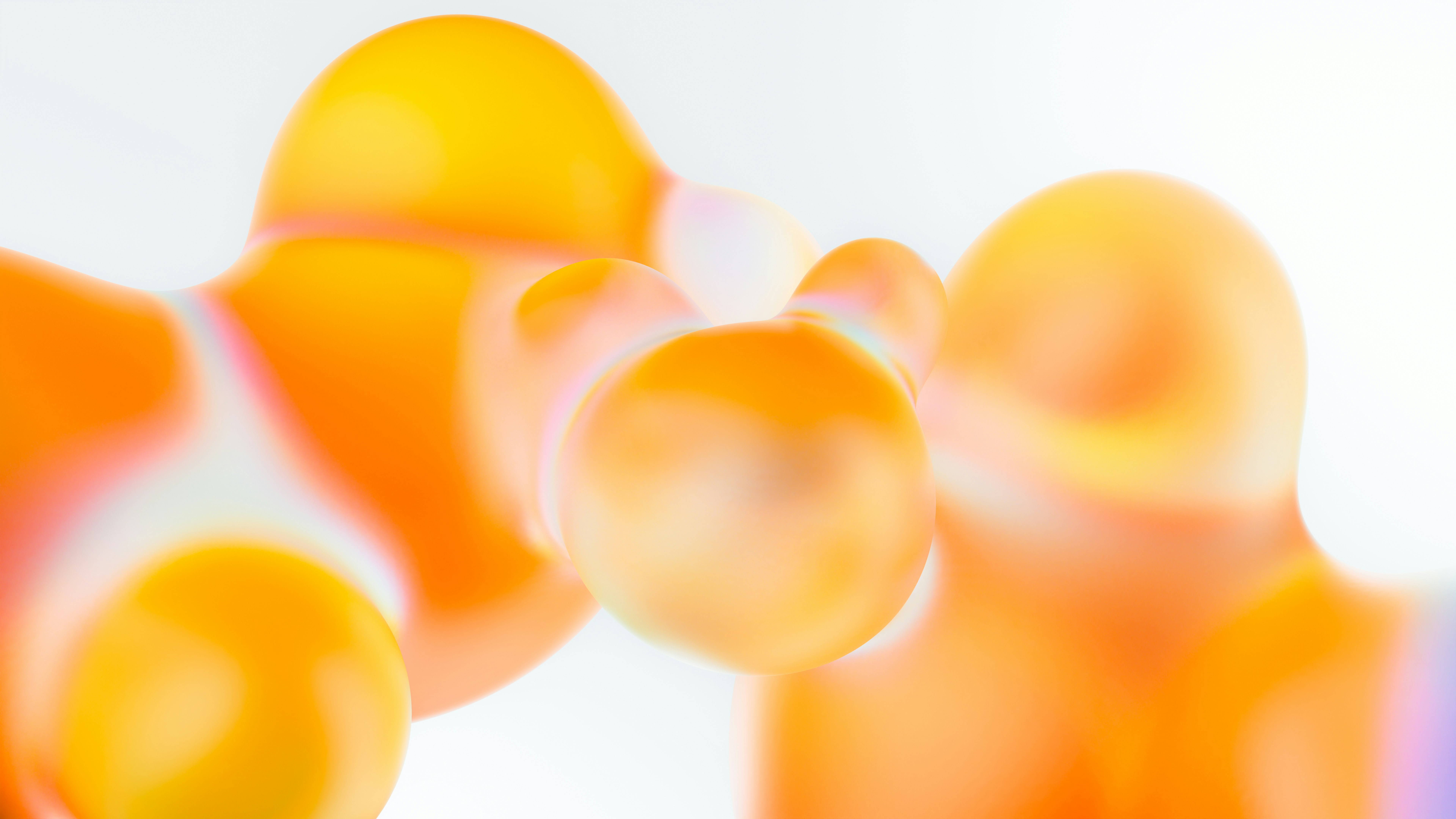 Blurred orange and yellow abstract shapes on white