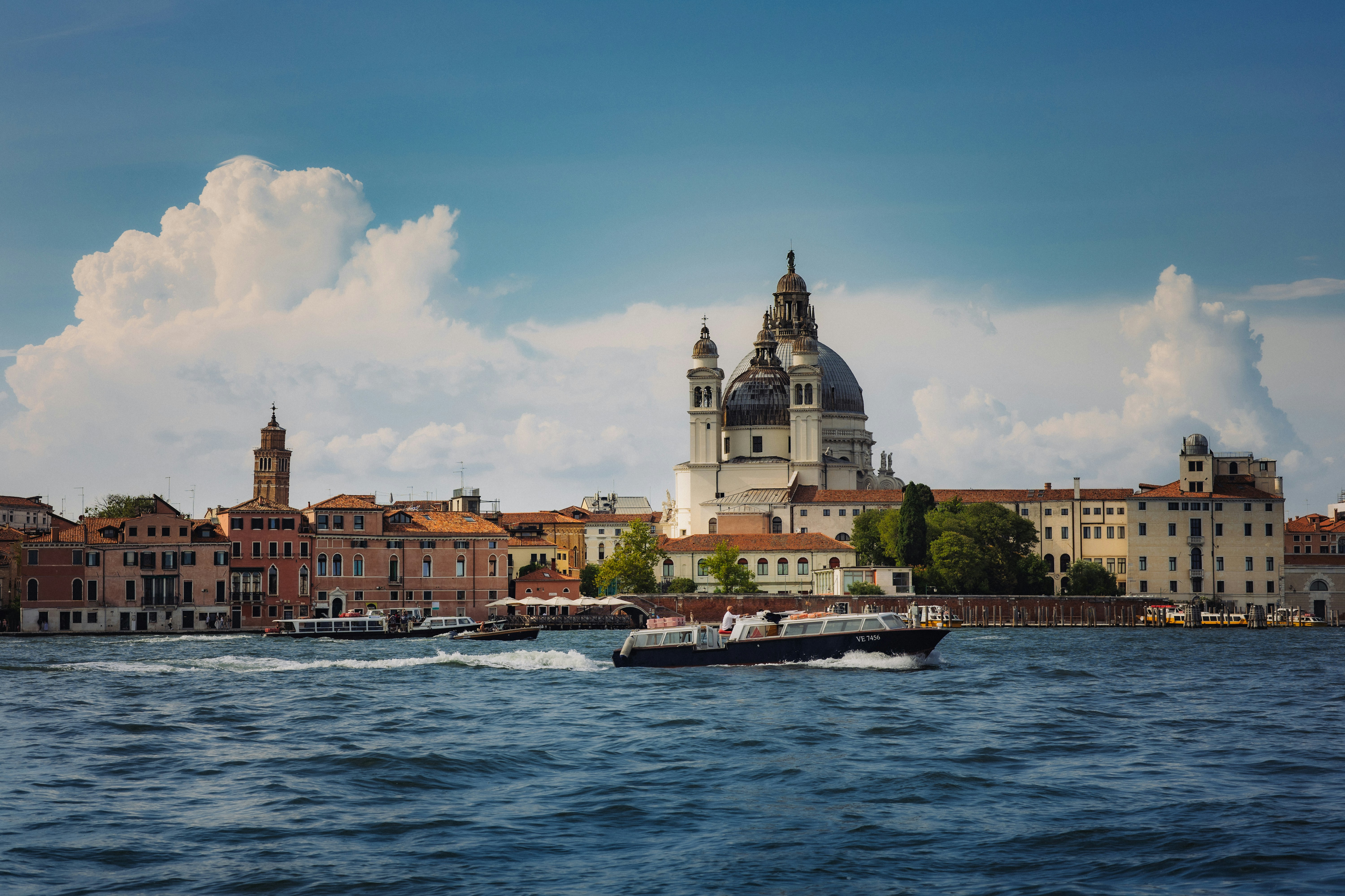 Grand canal venice with santa maria della salute and boats.