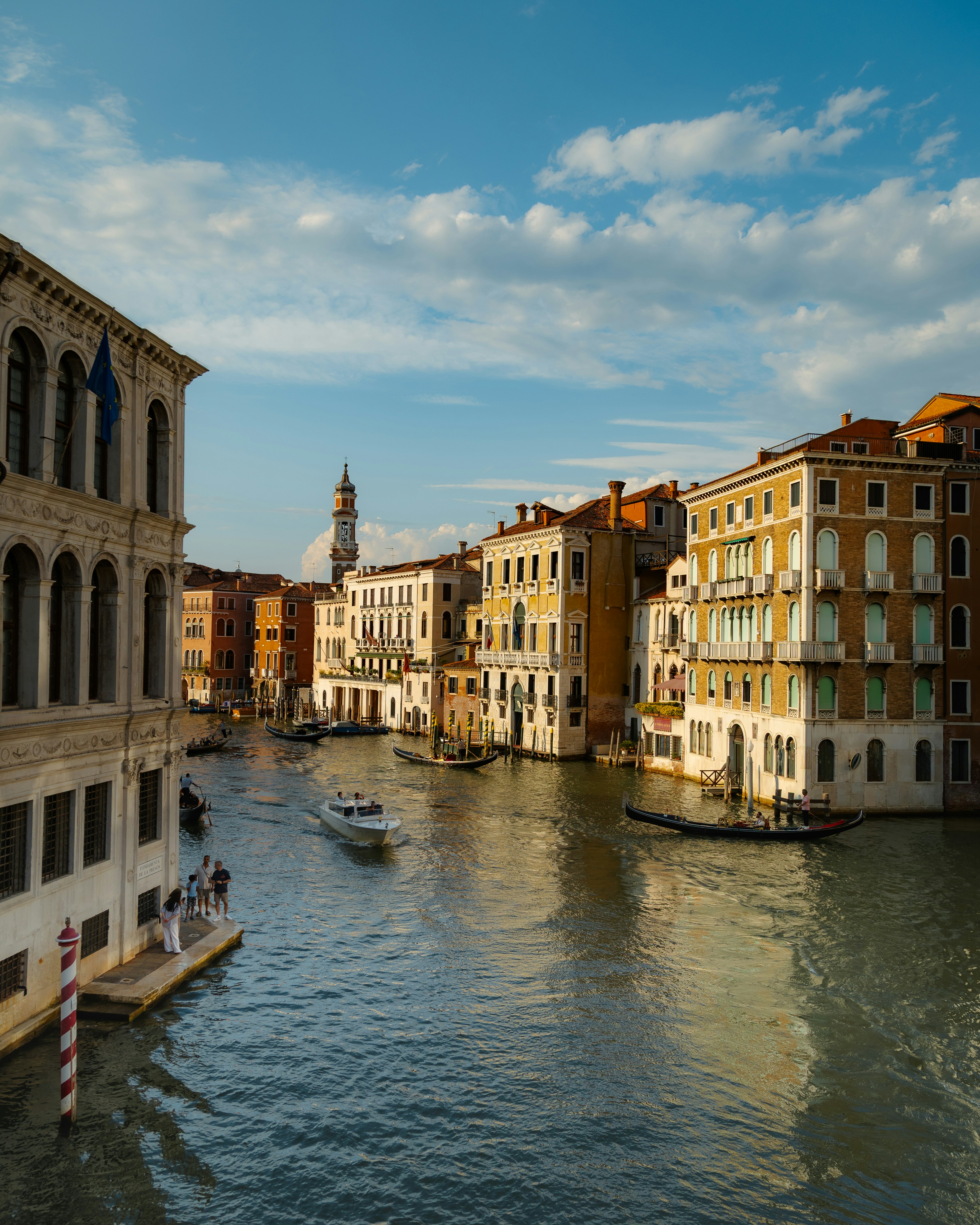 Grand canal in venice with historic architecture and boats.