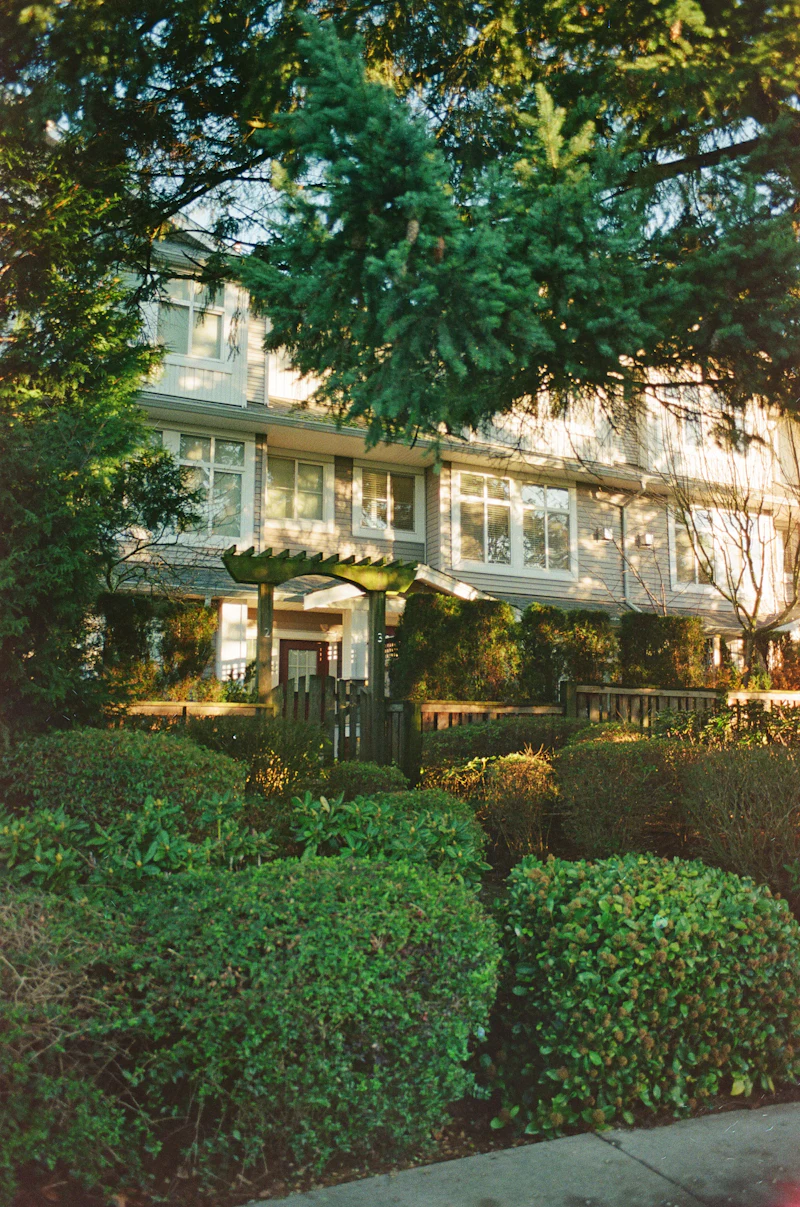 Low-rise residential building with landscaped grounds downtown
