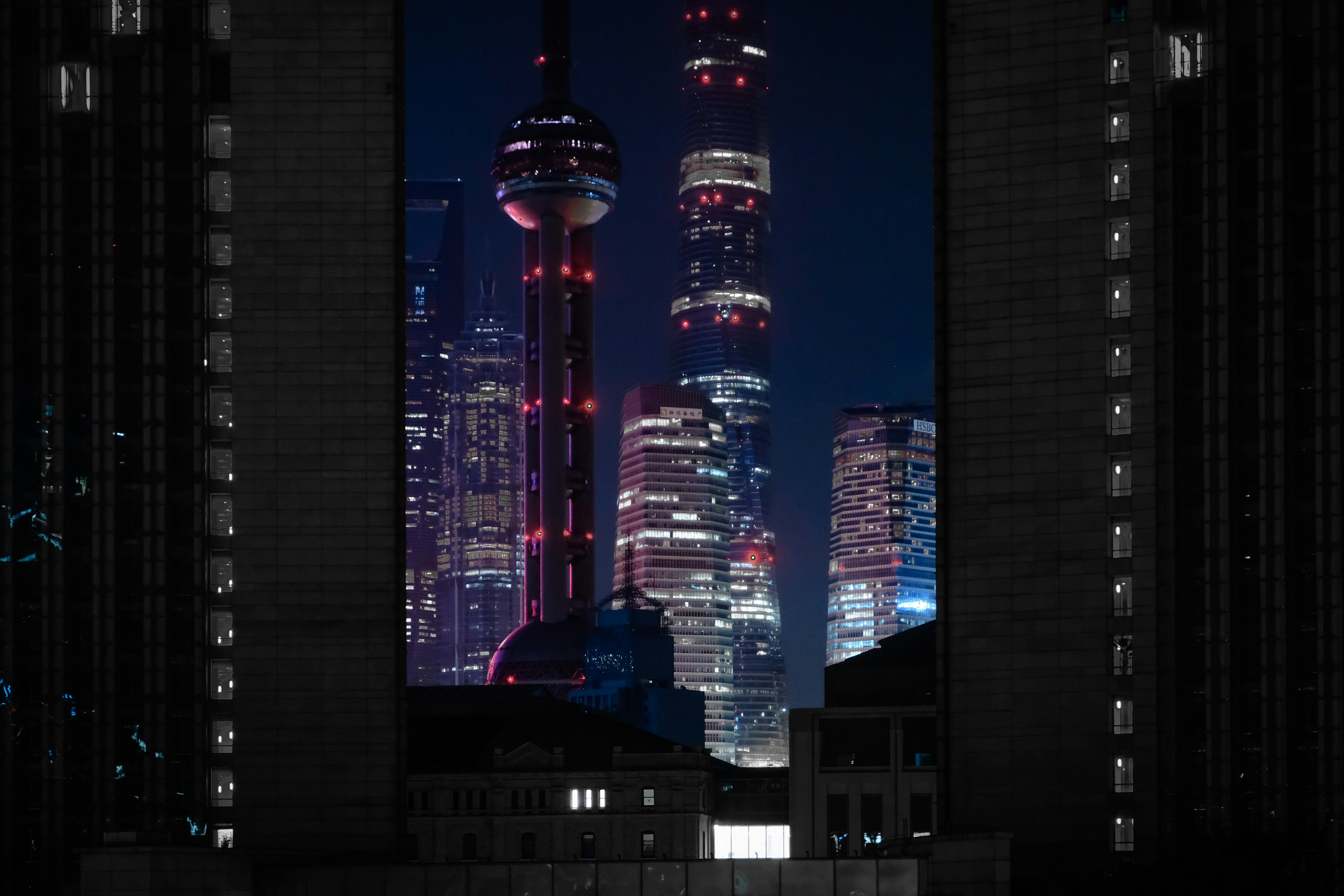 Vibrant cityscape with illuminated skyscrapers at night