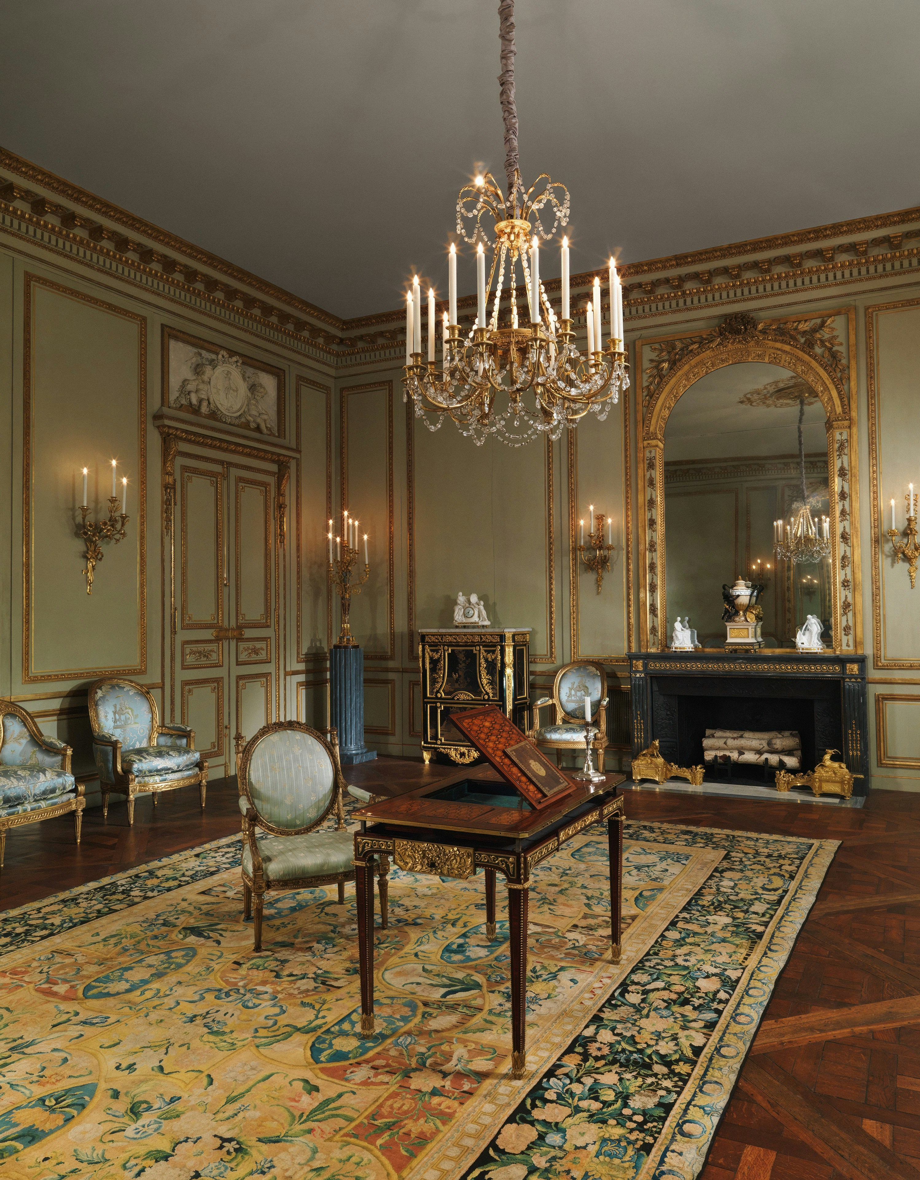 Haussmannian salon suite with gilded mirrors and soothing private atmosphere