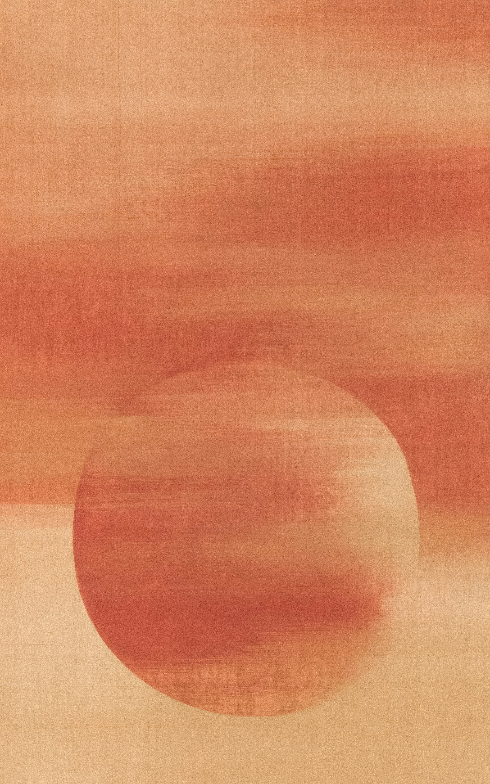 Blurred orange circle on a horizontally striped peach background.