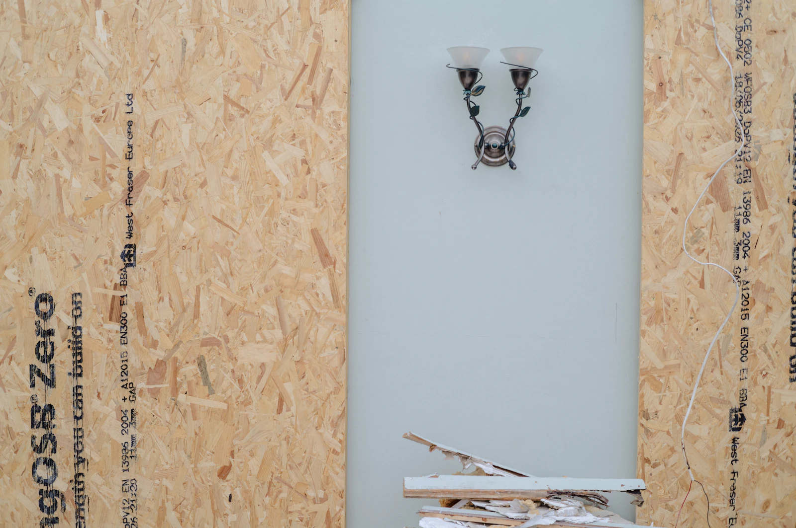 Oriented strand board (OSB) — the facing material bonded to a foam core to make most SIP wall and roof panels.
