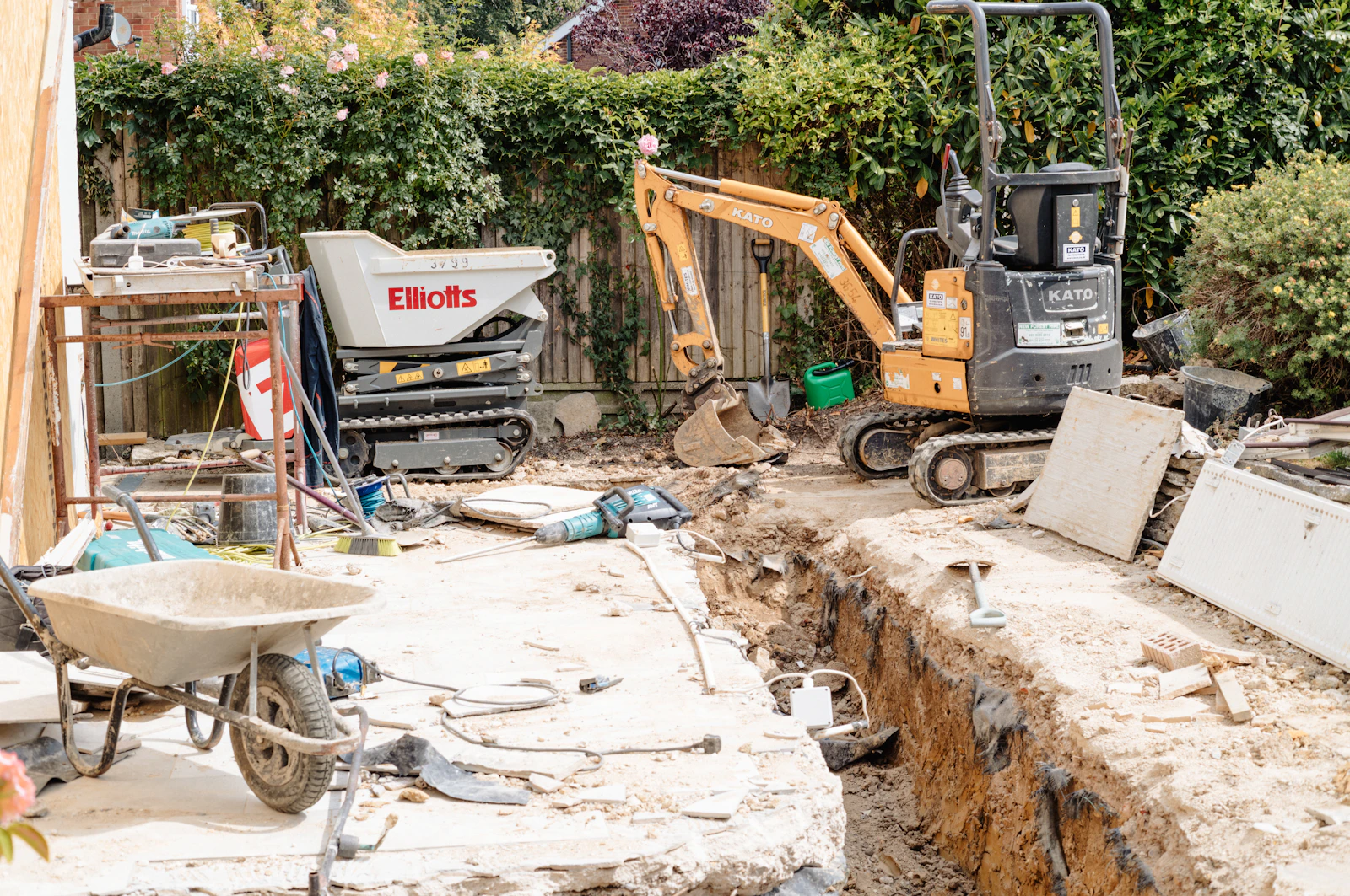 Excavator working in a yard