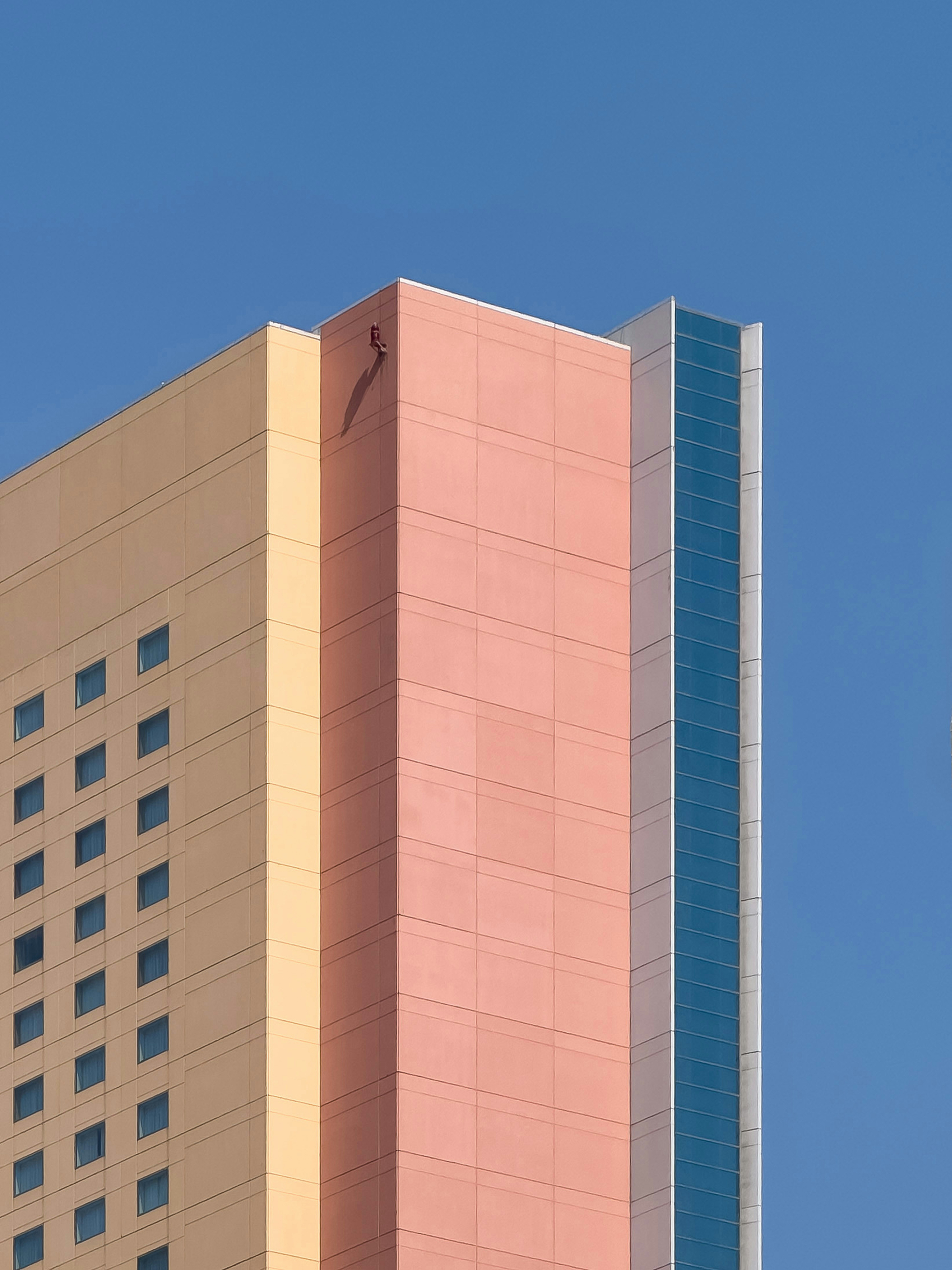 Colorful modern building under a clear blue sky.