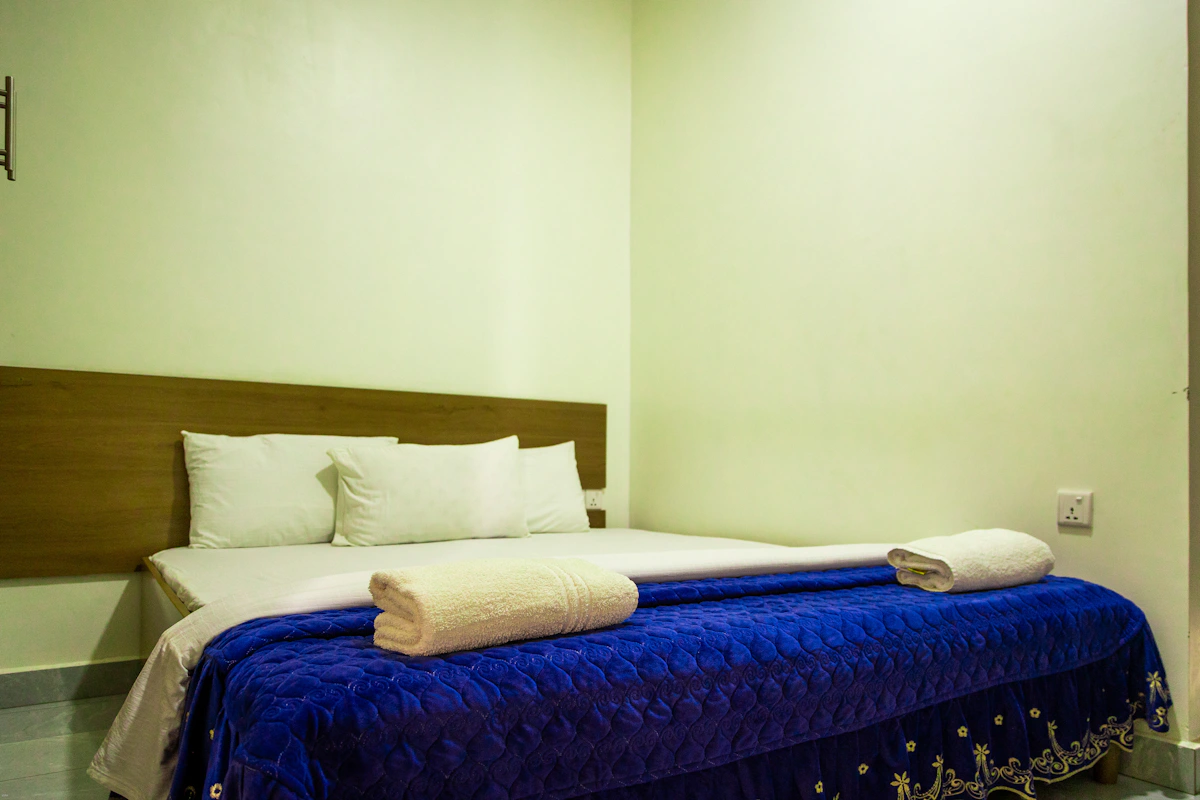 Simple clean hotel bedroom for economy accommodation