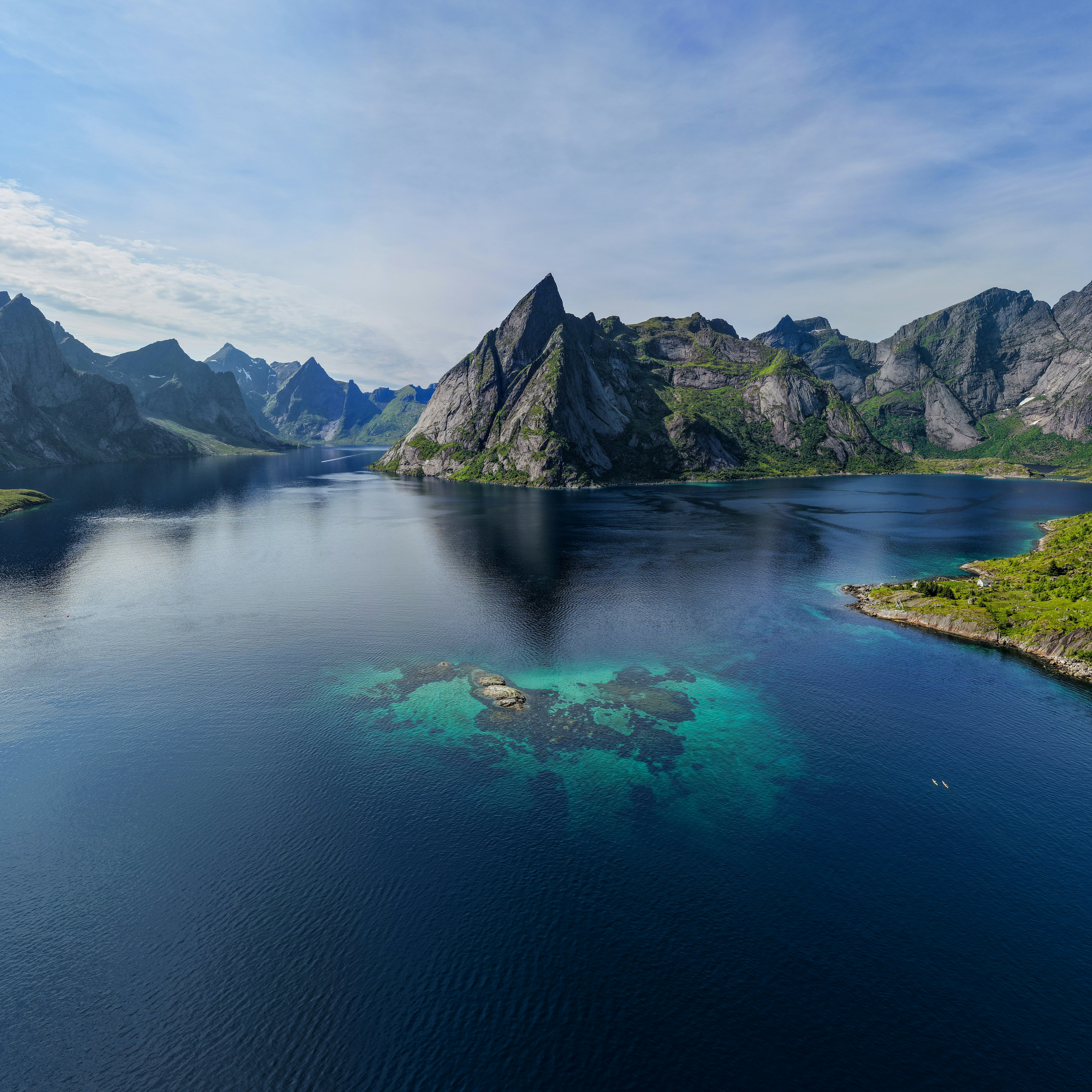 Reine fjord surrounded by majestic mountains and clear water